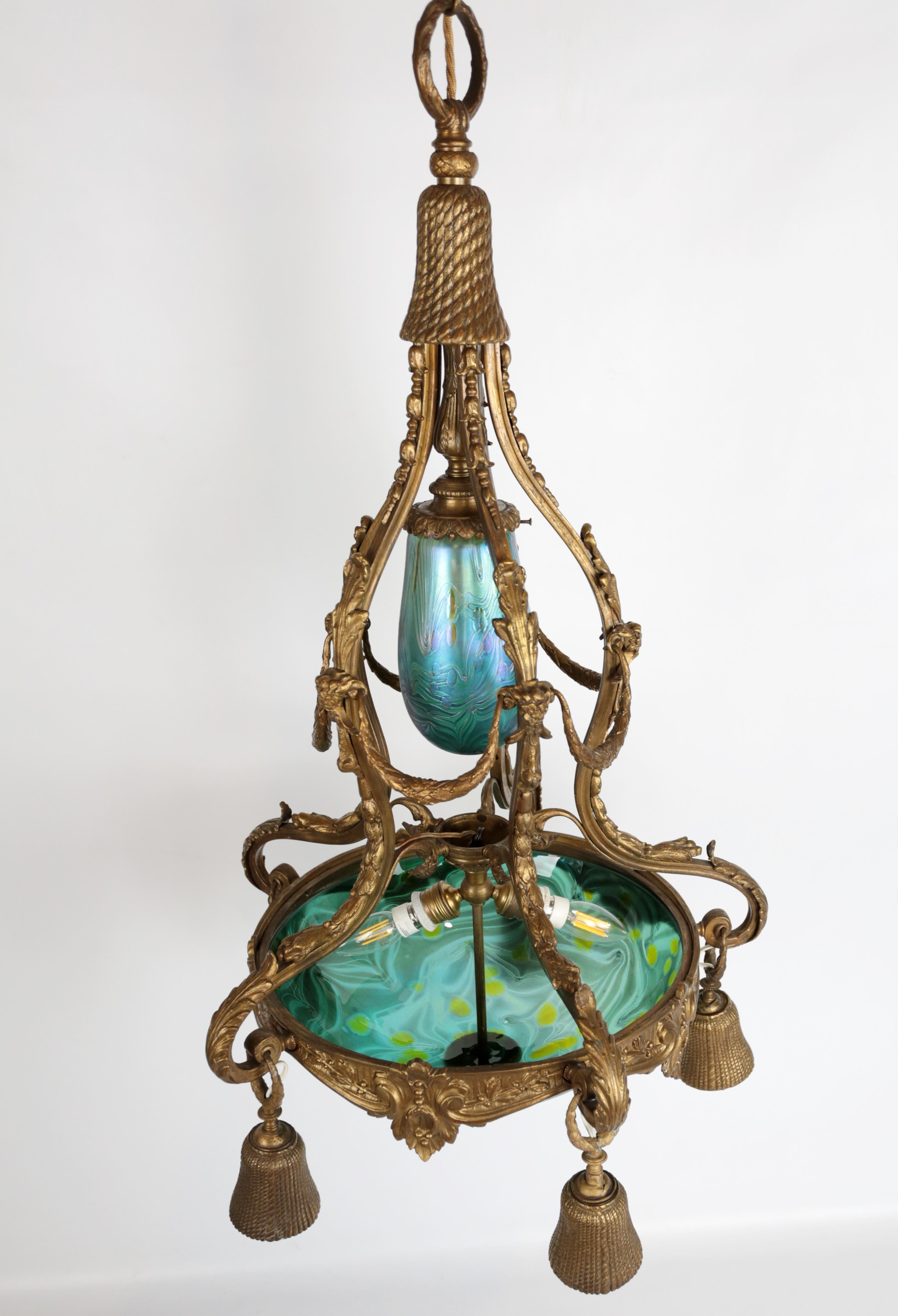 Art Nouveau bronze chandelier with iridescent glass shades For Sale 6