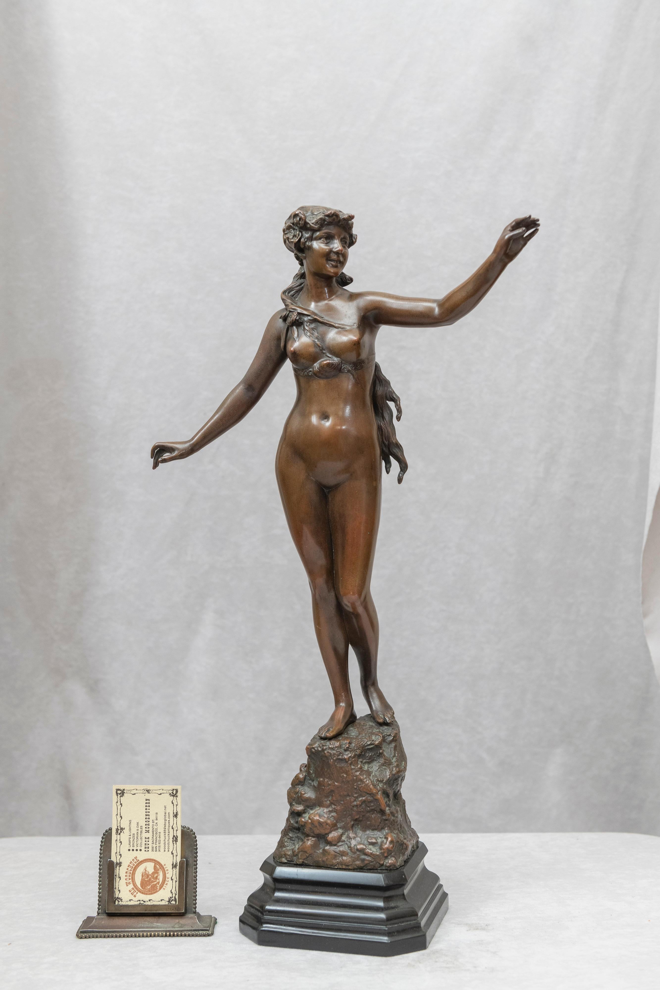 Offering here an antique bronze figure of a nude maiden, signed Berndorf. Berndorf was a German foundry started in the mid-19th century. The figure is richly patinated in a warm brown color and mounted on a black marble base. A lovely and graceful