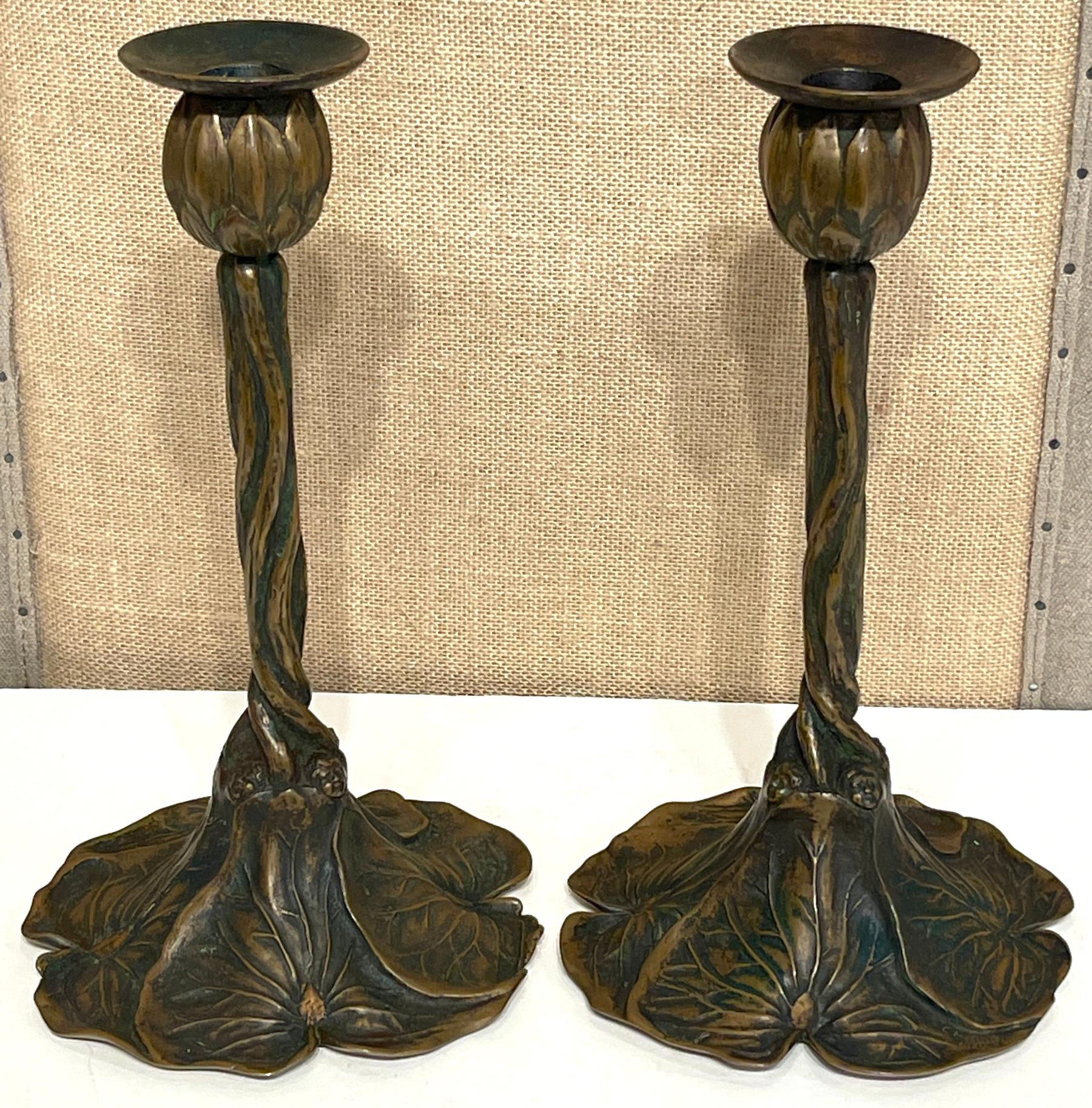 Art Nouveau Bronze Lily Pad & Water Nymph Candlesticks, Signed CH Barr, 1902 

This exquisite pair of Art Nouveau Bronze Lily Pad & Water Nymph Candlesticks, signed CH Barr and dated 1902, are exceptional examples of the whimsical, organic motifs