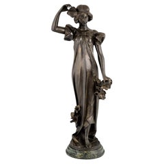 Art Nouveau bronze sculpture lady with poppies signed by Adolpho Cipriani