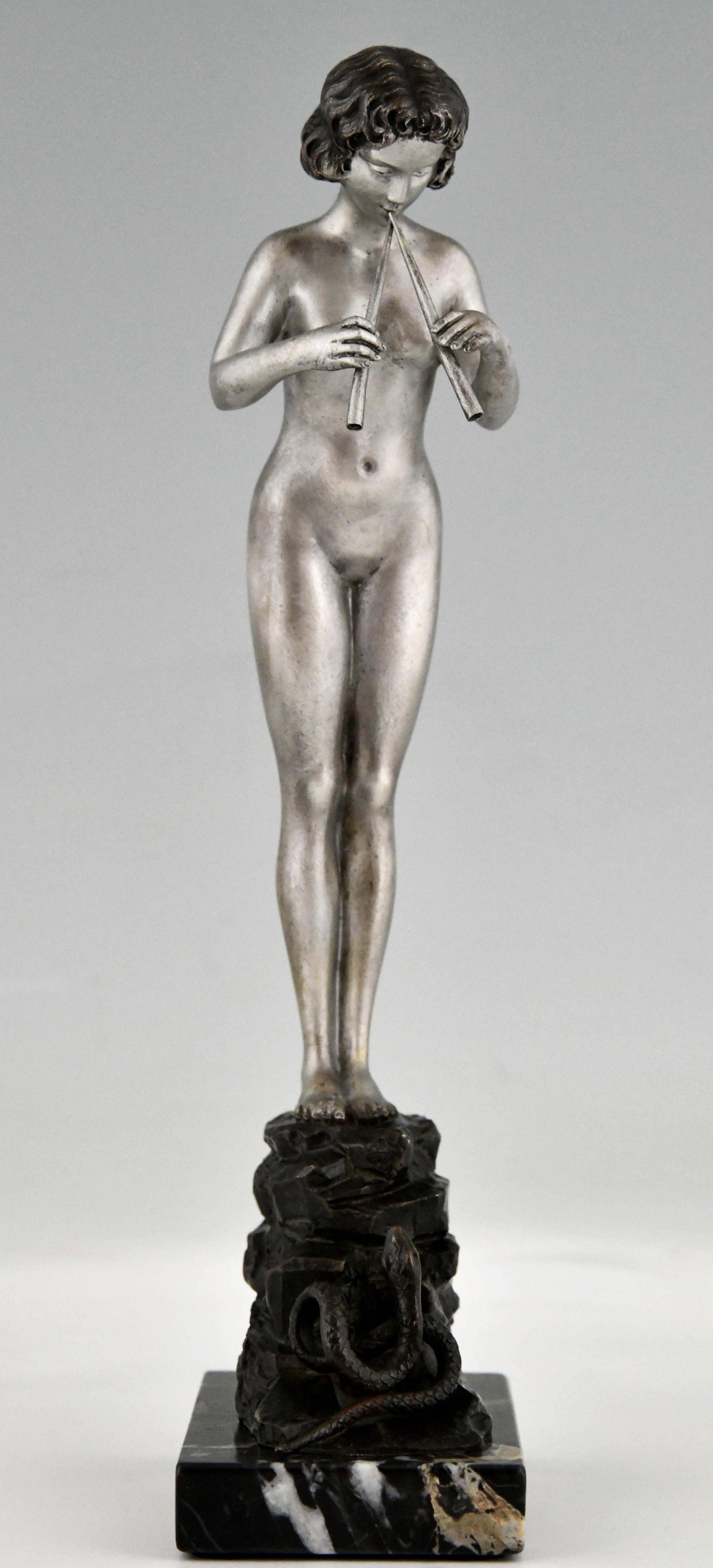 Art Nouveau bronze sculpture nude snake charmer, Germany ca. 1900. 
Bronze sculpture with silver and brown patina on a Portor marble base. 
This bronze is illustrated in:
Bronzes, sculptors and founders by H. Berman, Abage.