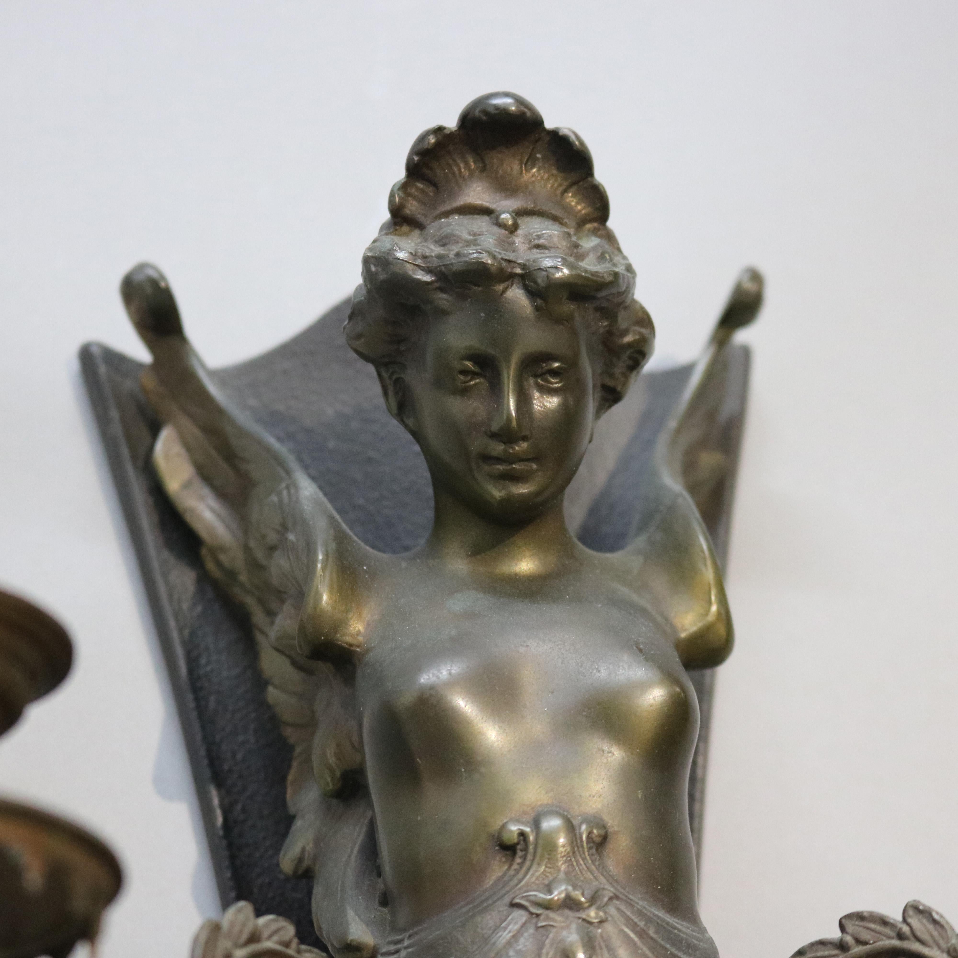 Art Nouveau Bronzed Metal Figural Four-Light Wall Sconce with Woman Figure 20thC

Measures - 13