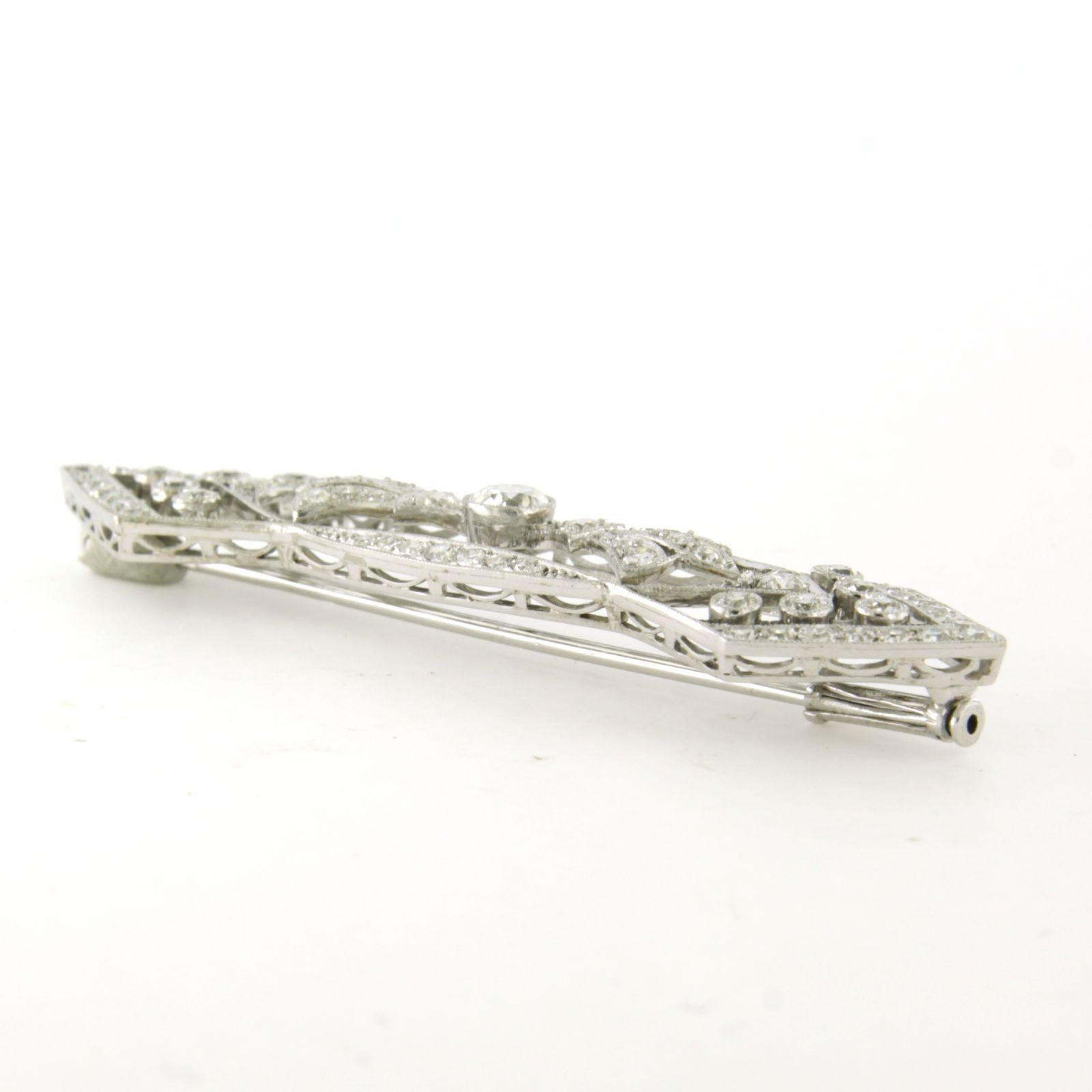 Spilla ART NOUVEAU in oro bianco 18k con diamanti antichi europei e diamanti a taglio singolo. 1,90ct - F/G - VS/SI 

descrizione dettagliata:

la dimensione della spilla è di 6,0 cm di lunghezza per 1,5 cm di larghezza

peso 7,5 grammi

impostato