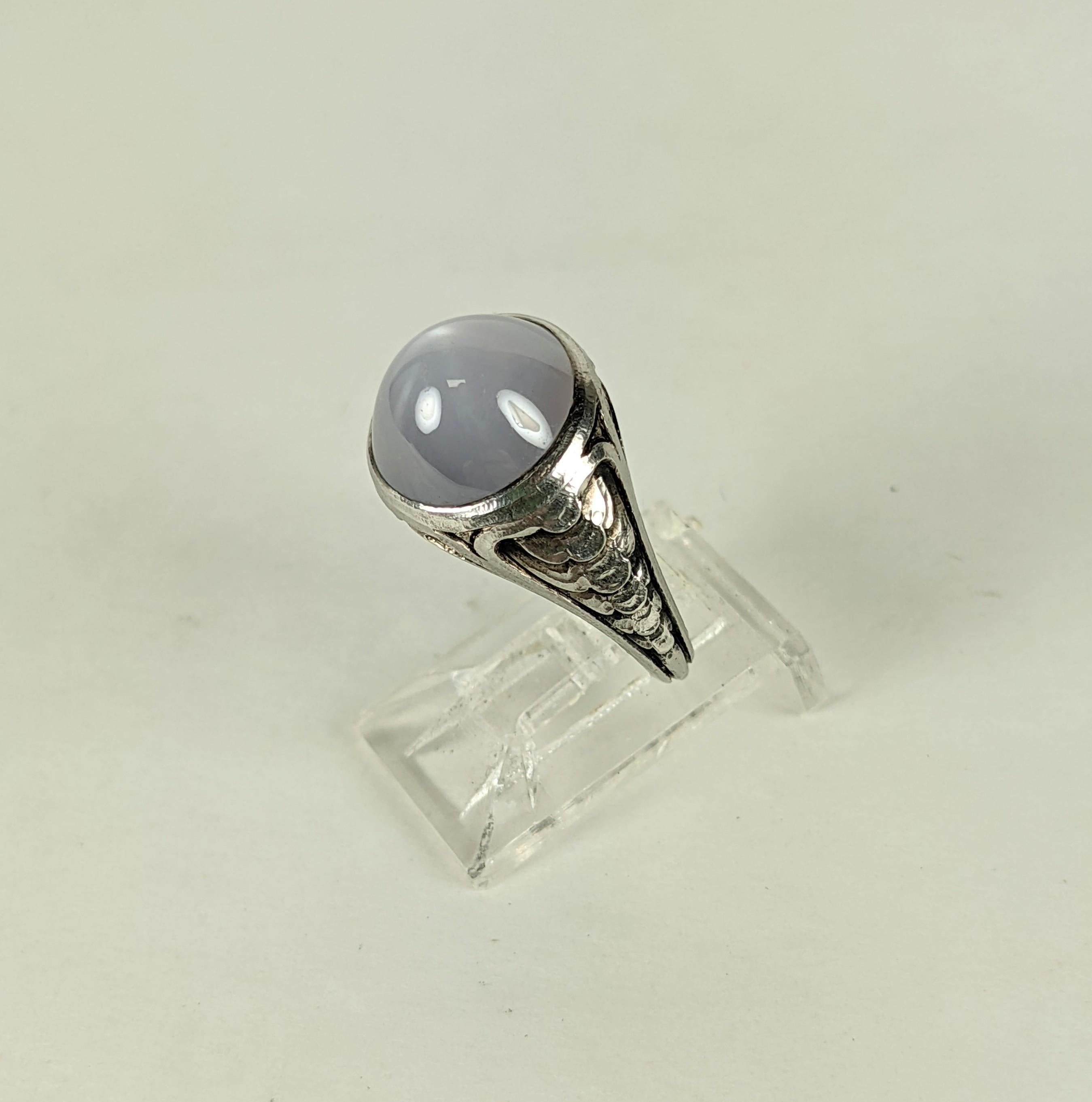 Art Nouveau Bullet Cabochon Star Sapphire pinky ring set in platinum from the early 20th Century.  10mm star sapphire with elegant, scalloped setting circa 1900's USA. 
Smaller Size 4.
