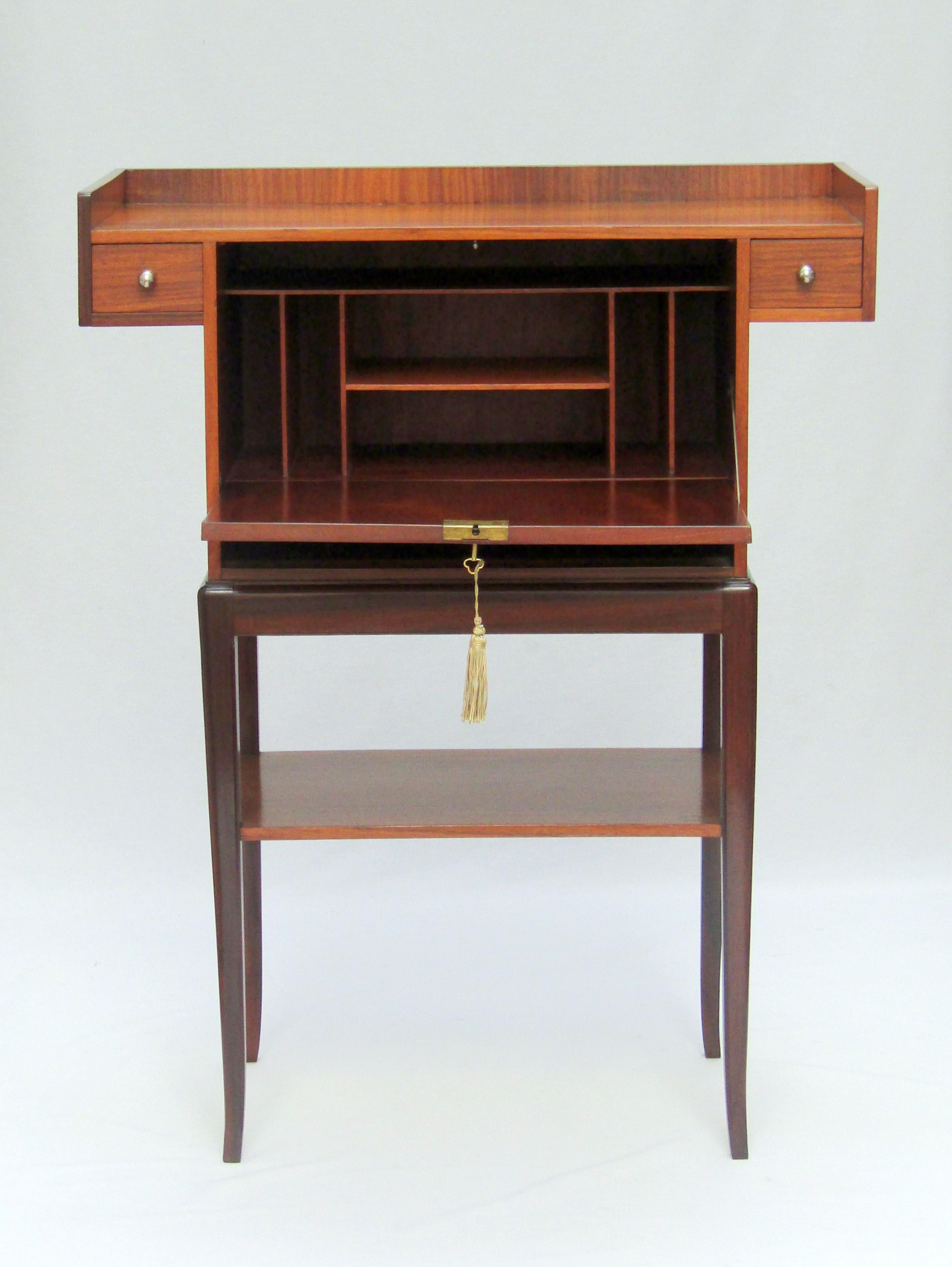 An Art Nouveau mahogany drop front
writing desk with mother of pearl
inlay by Louis Majorelle (1859-1926)
Stamped Majorelle Nancy
French, circa 1925.