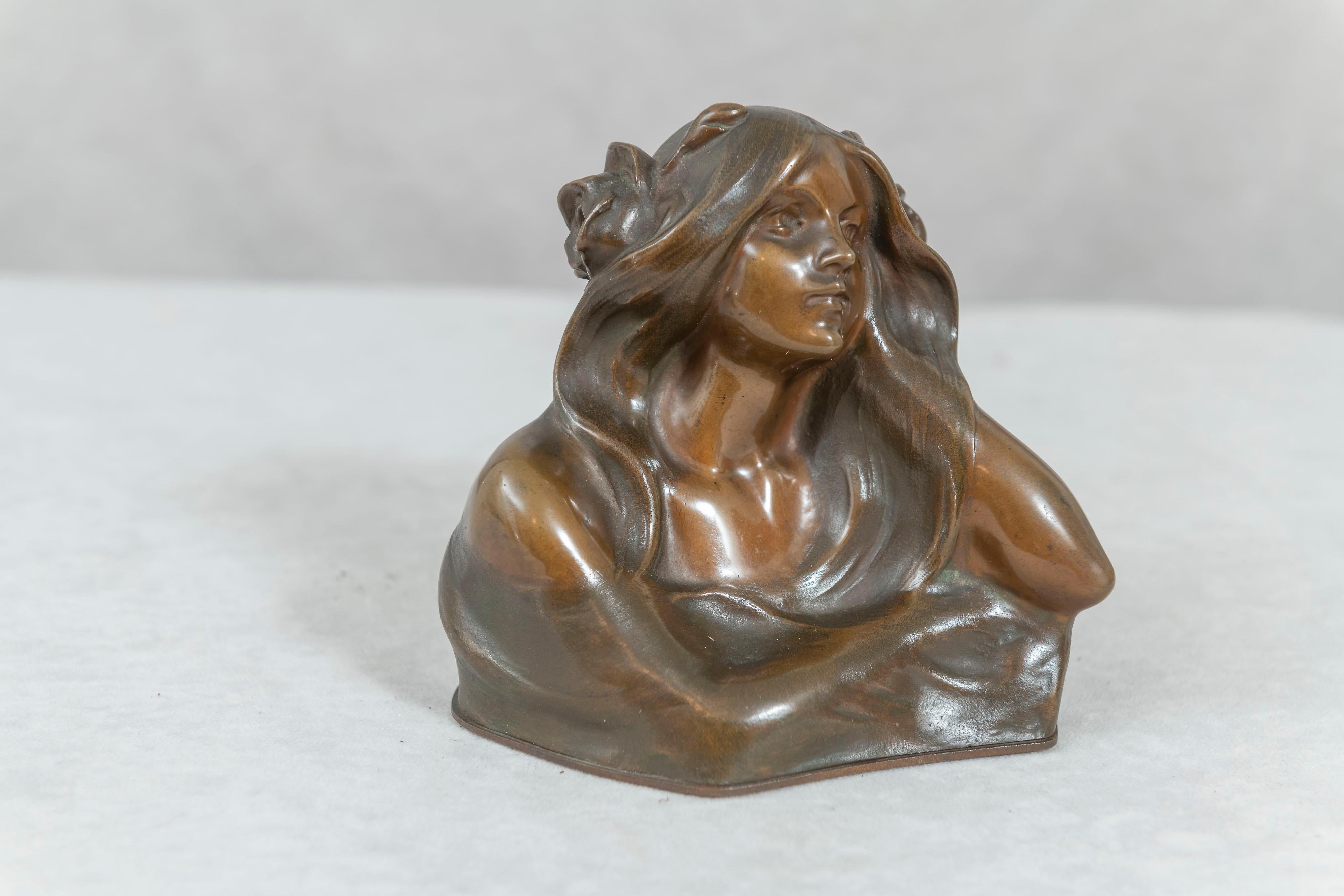 This bronze looks luscious in the photos with that rich warm 2 tone patina, and that is how it looks in person. She sat on my nightstand on my side of the bed for years. My wife did me give the okay, and with a smile.
The bronze is signed and done
