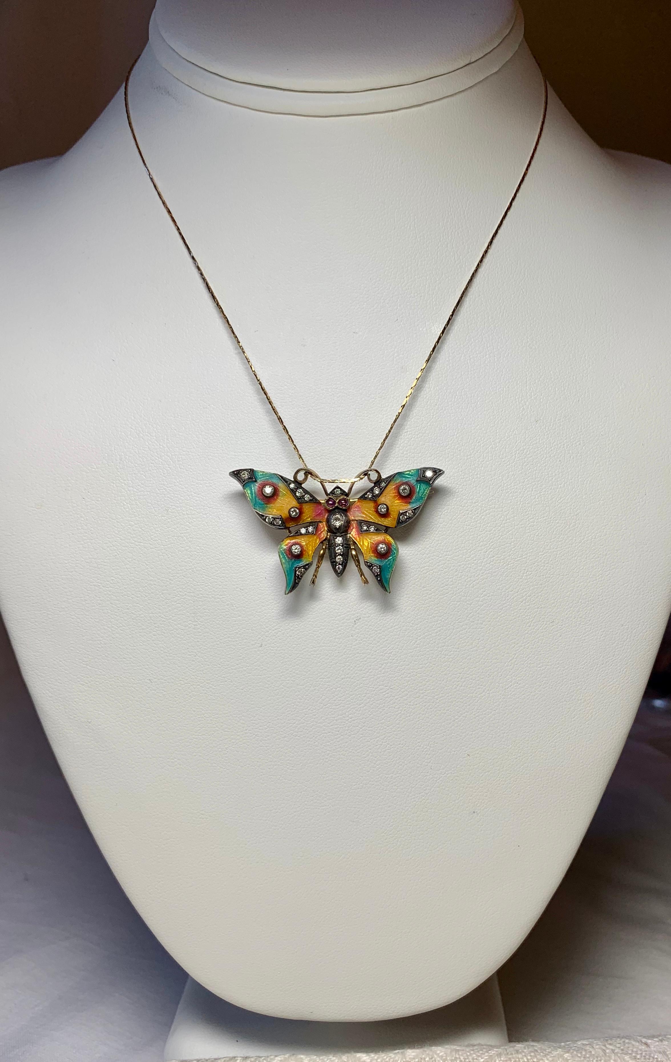 A wonderful and rare early Art Nouveau Brooch Pendant in the form of a Butterfly.  The magnificent Butterfly is 18 Karat Gold. 
It is set with 30 gorgeous Old Mine Cut Diamonds.  These diamonds are just stunning - very white with the incredible