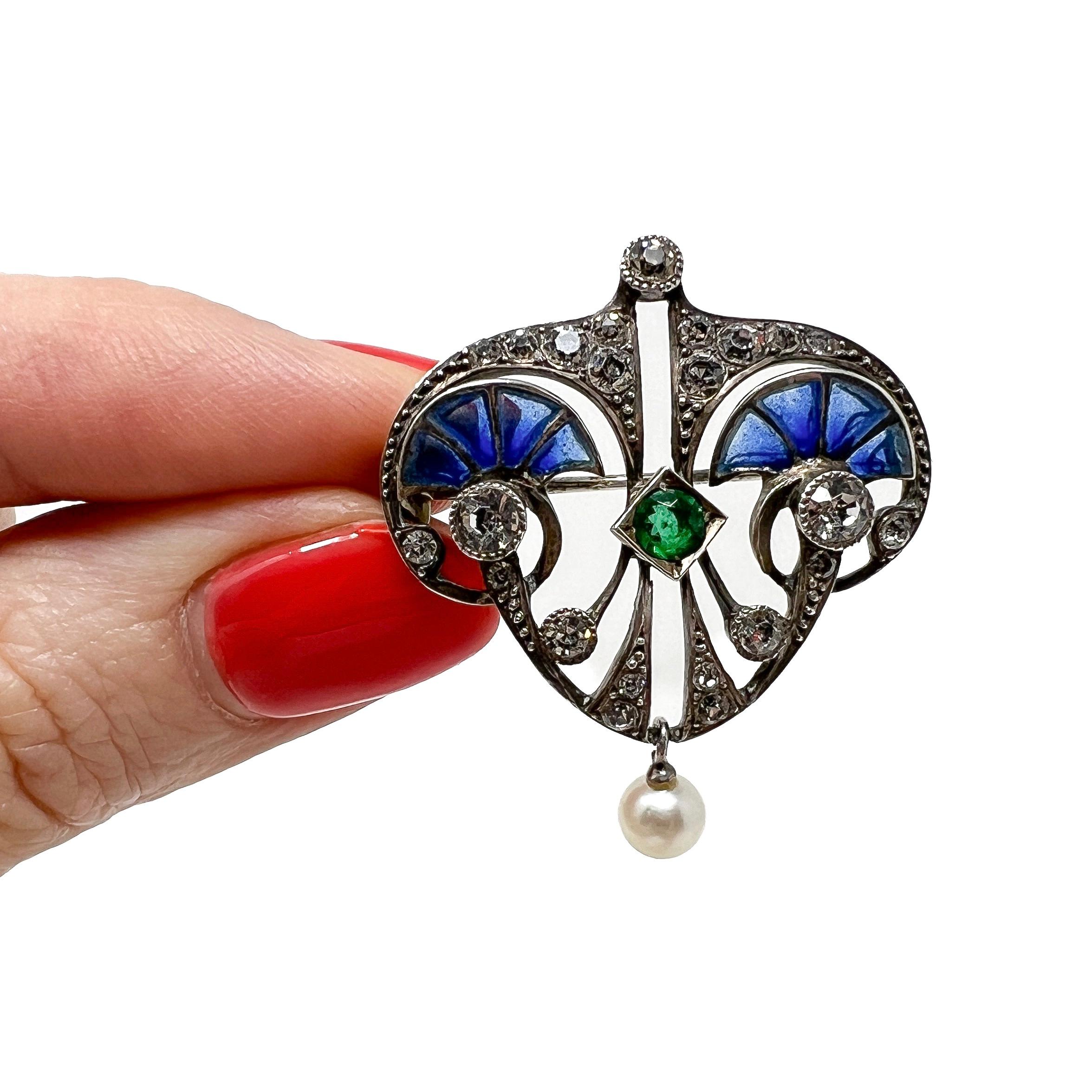 This outstanding brooch was made in France and features a wonderfully elegant original Art Nouveau design.

Condition Report:
Excellent

The Details...
This brooch is constructed from silver - it is stamped '935' on the reverse. The brooch was made