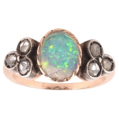 Anello Art Nouveau con Opale Cabochon e Diamante Rosa del 1910