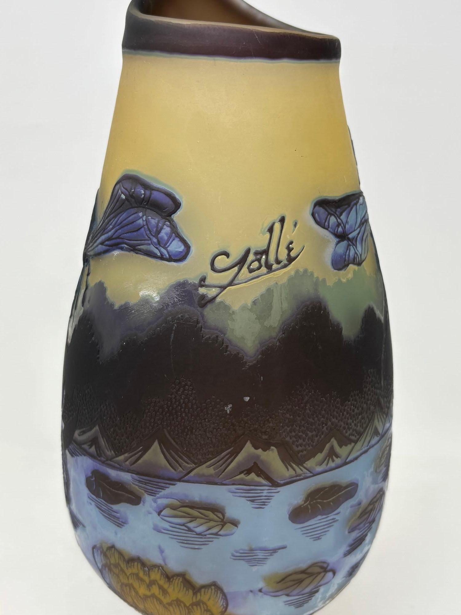 Large Art Nouveau Cameo Vase after Emile Galle 14 inches height.In the style of French Art Nouveau, Galle Cameo glass vase, several layers with tones of browns, beige overlaid in turquoise and decorated with flowers,a dragonfly and frogs.The vase