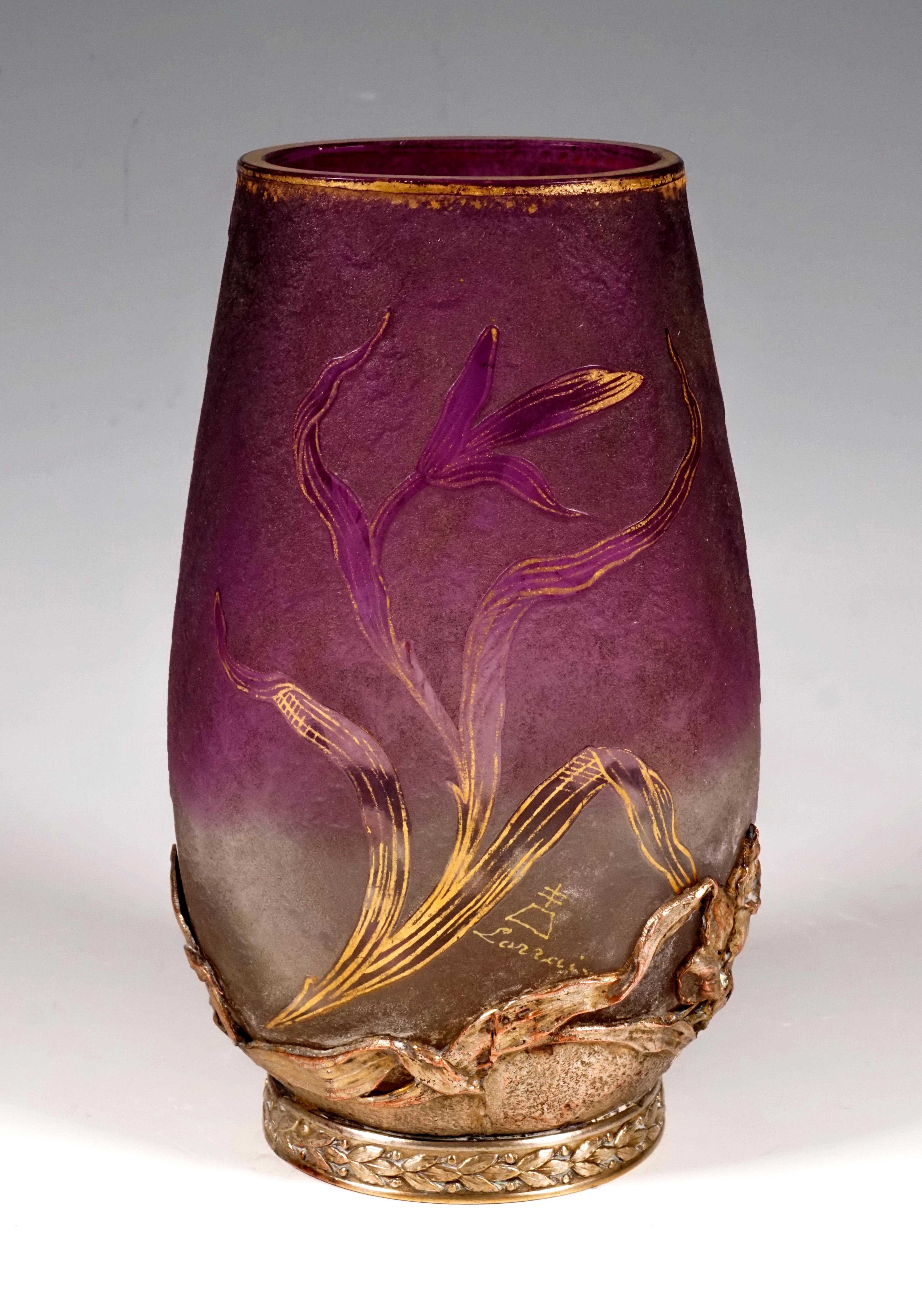 Vase in oval, bulbous shape, tapering straight towards the top, cut, gilded mouth rim, colorless glass with violet meltings in the upper area, decor of iris flowers with stem and leaves in high cut and provided with gold heightening, satined surface