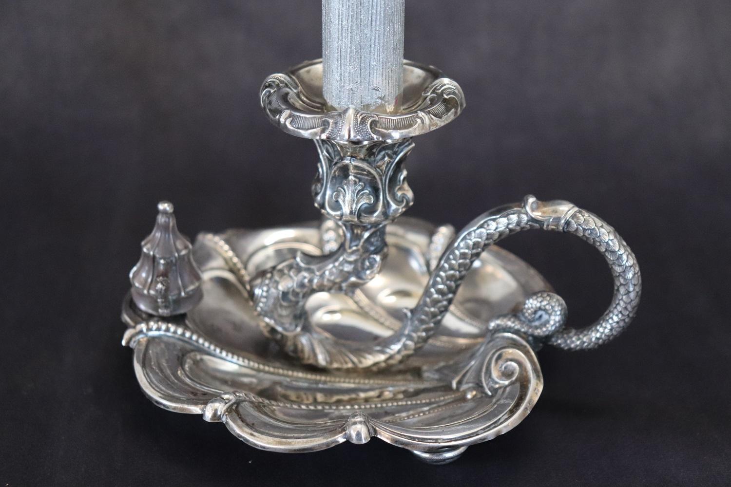 Beautiful late 19th century sterling silver candle holder. Refined finely chiseled decorations. Made by the famous German silversmith Wilhelm Binder engraved hallmark 800 WTB with crown and half moon. Weight Grams 136