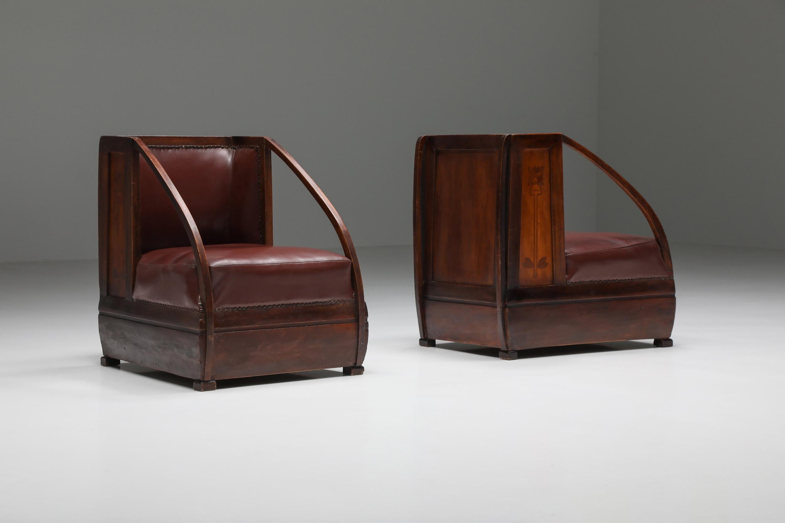 Art Nouveau, Carlo e Piero Zen, Italy, 1910, Italian design, 

Art Nouveau pair of armchairs by Carlo and Piero Zen. Remarkable use of mahogany, burgundy leather, and fruitwood inlay. Authentic and important historic design piece. Carlo and Piero