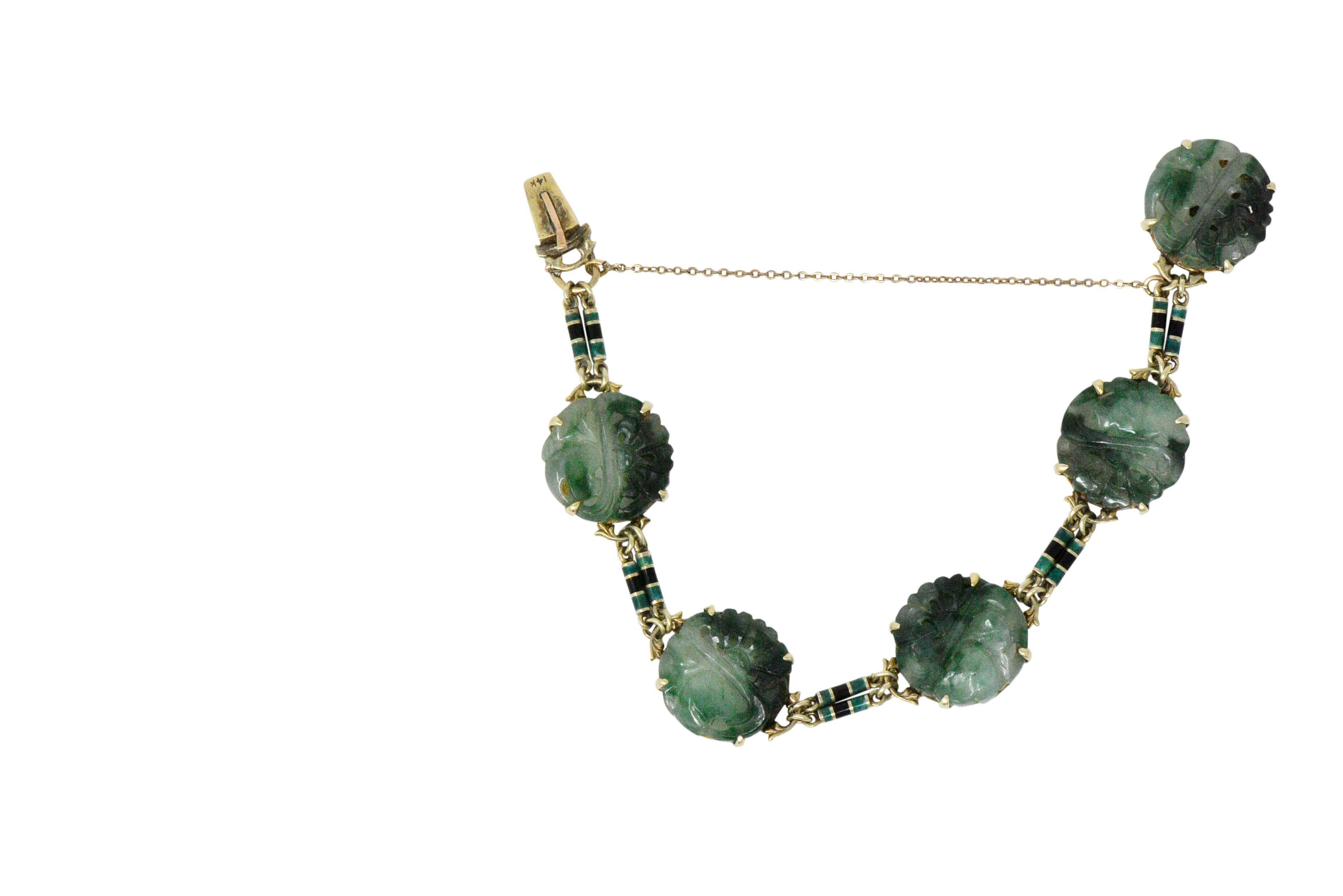 With five round carved jade disc links, dark green, green and white mottling 

Fun stripe green and black enamel spacer links 

Bright and colorful bracelet

Concealed clasp with safety chain

Length: 7 inches

Jade Disc Diameter: Approx. 16.5