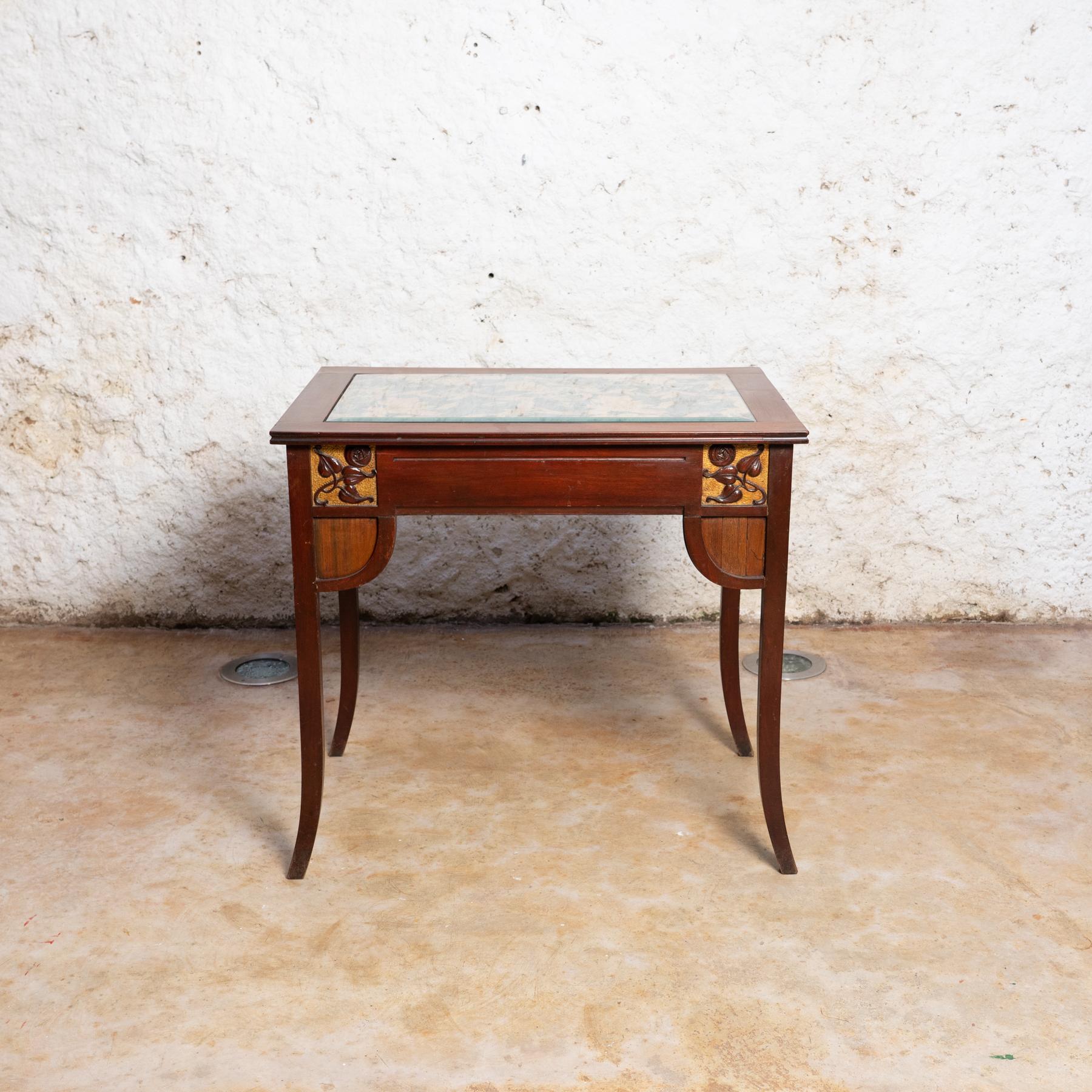 Art nouveau side table by unknown manufacturer from Spain, circa early 20th century.

In original condition, with minor wear consistent with age and use, preserving a beautiful patina.

Material:
Wood.

