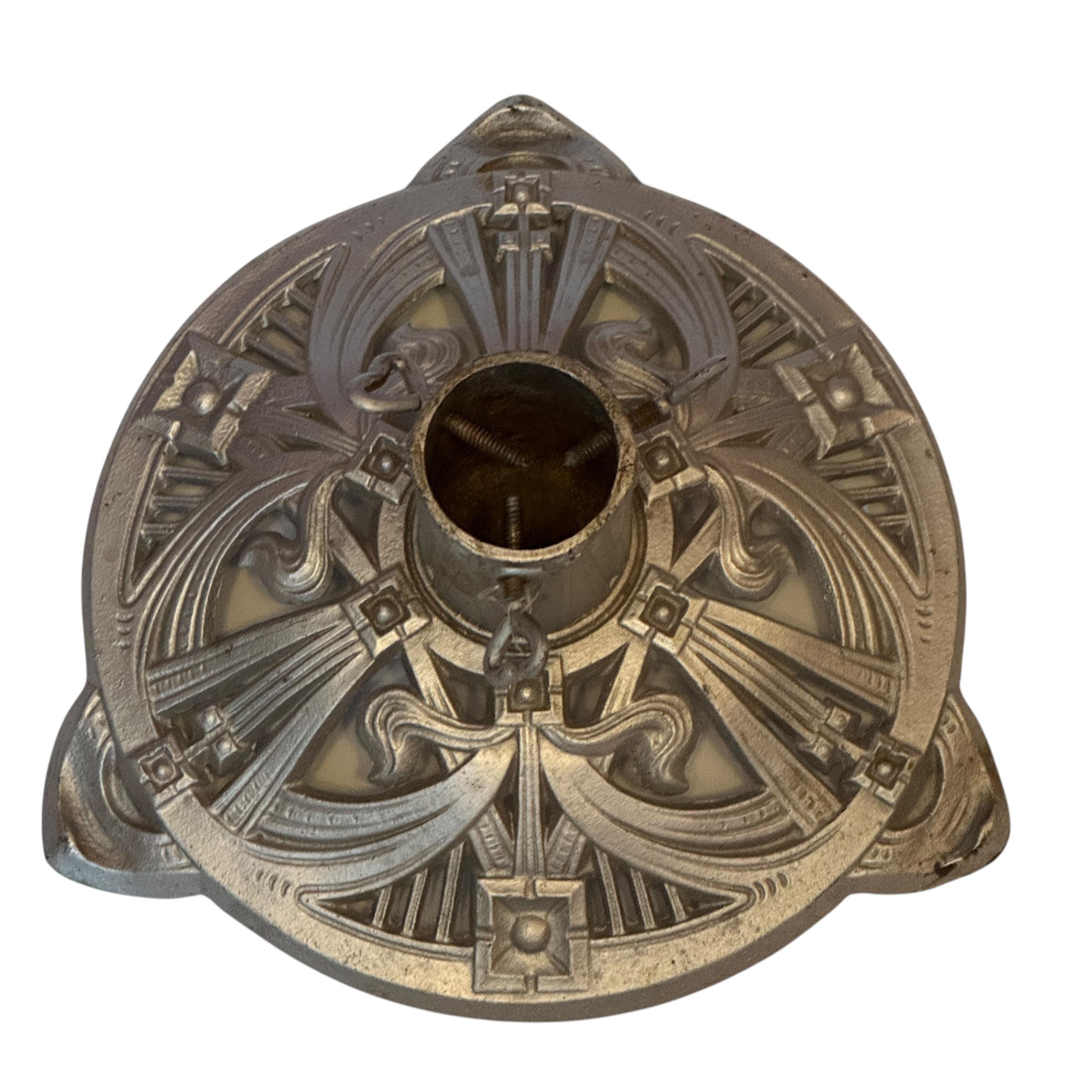 This beautiful Art nouveau silver color cast iron Christmas tree stand, was made in Germany, in the 1910s. A nice addition for your Christmas decoration. It holds a stem up to 1.88 inches in diameter. Looks great with your feather tree. Found at an