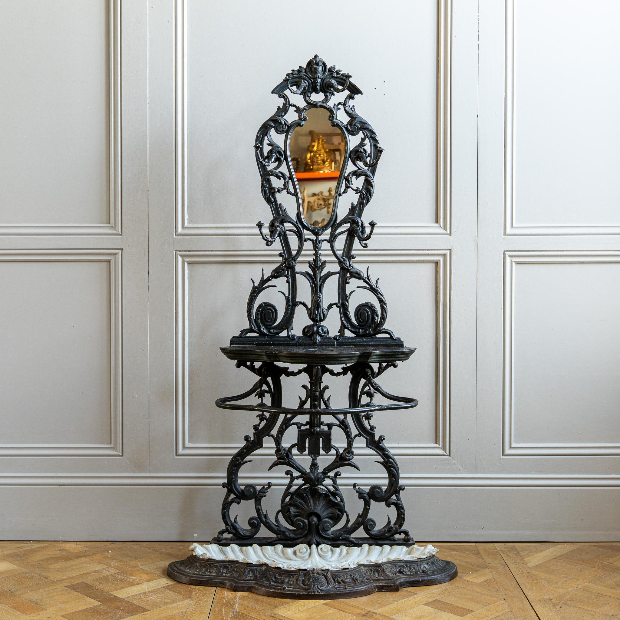 An exceptional late 19th‑century French cast‑iron hall tree (porte‑manteau) produced by the Alfred Corneau foundry in Charleville, France. This is the less commonly seen Model No. 30, clearly stamped on the base cartouche, originating from the
