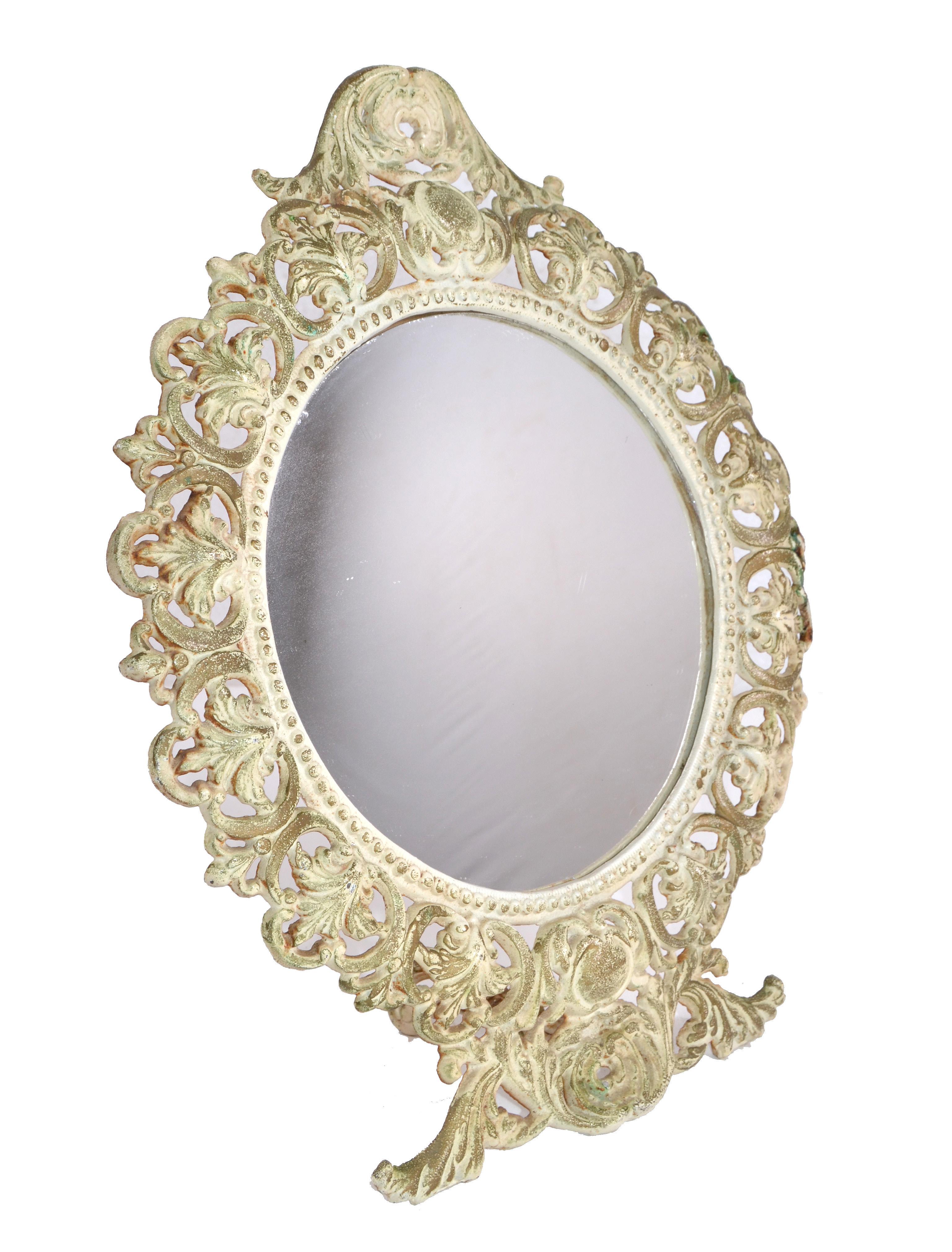 Lovely Art Nouveau cast iron vanity mirror or table mirror.
Very decorative with hearts and flower motives.
The backing is made out of wood.
We left it in the distressed original finish.