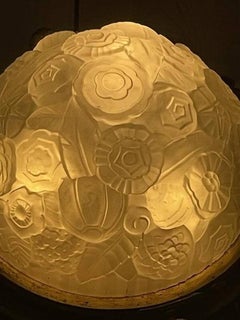 Art Nouveau ceiling light in molded glass and gilt bronze