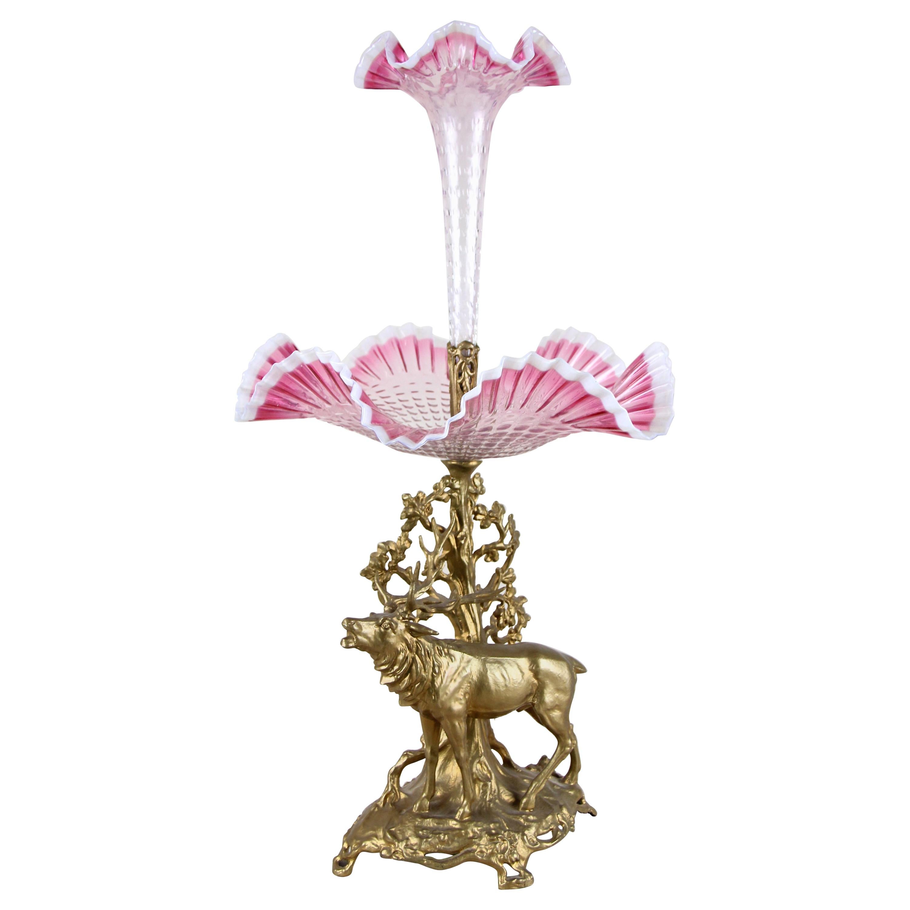 Extraordinary, large Art Nouveau centerpiece with frilly glass bowl and vase, made in Austria in the turn of the century circa 1900. The beautiful pastel pink shining glass bowl sits on an artfully processed bronzed metal cast base depicting a