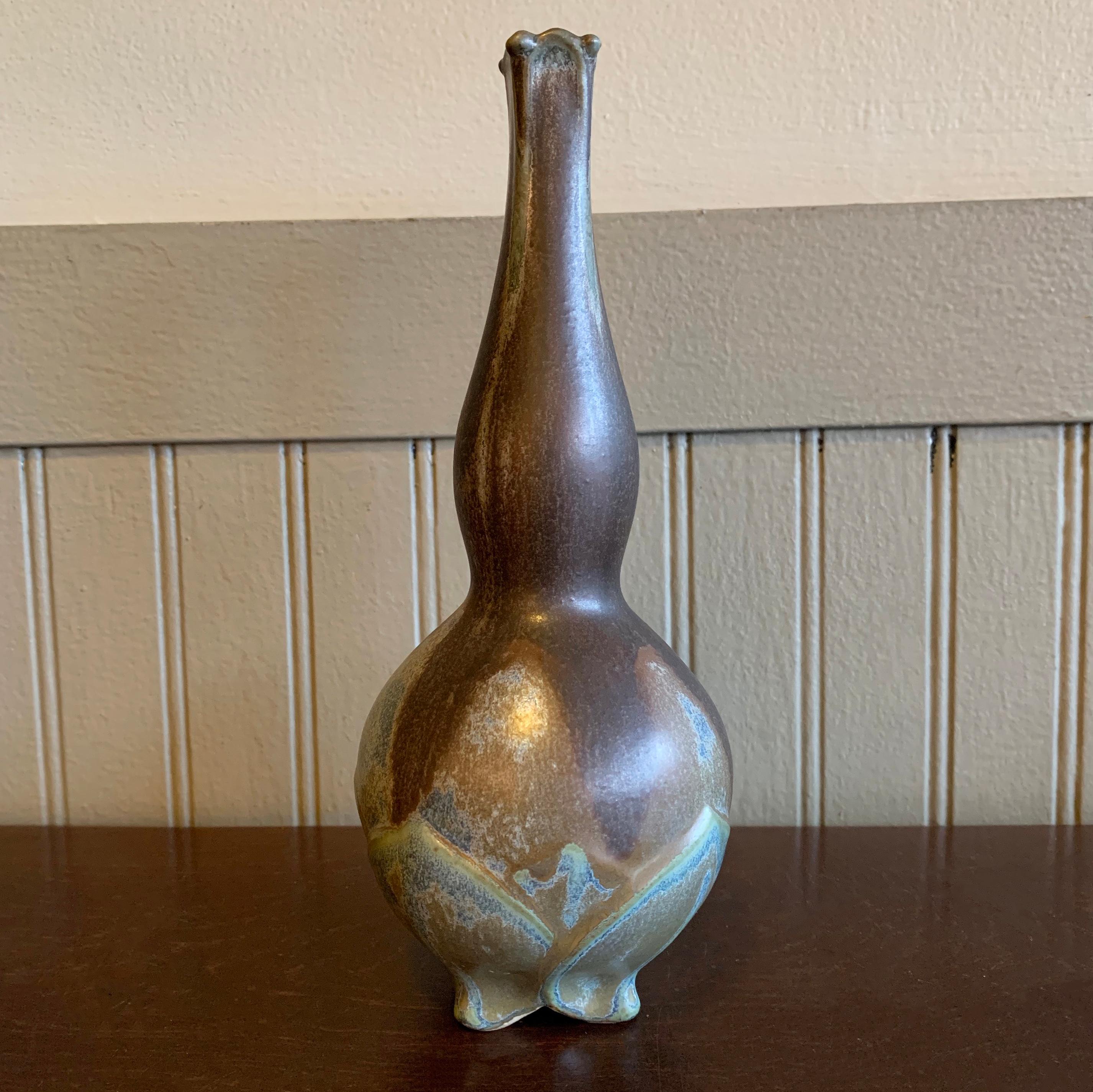 Art Nouveau, ceramic, art pottery, bud vase features a petal motif base with wonderful glaze.
