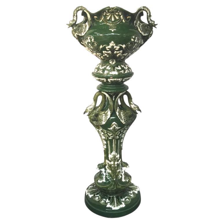 Art Nouveau ceramic pedestal and its planter, circa 1900. Swan and plants design For Sale