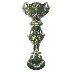 Art Nouveau ceramic pedestal and its planter, circa 1900. Swan and plants design