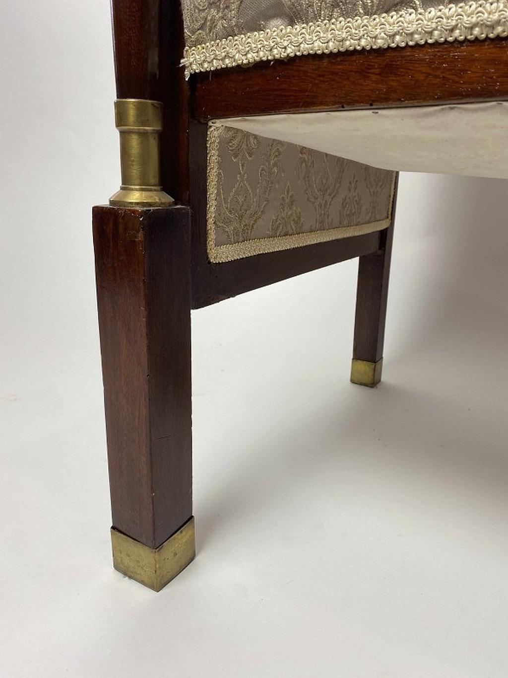 Large comfortable Art Nouveau cube-shaped armchair, smooth front columns fitted with brass fittings atributed to Hans Christiansen for Darmstadt.