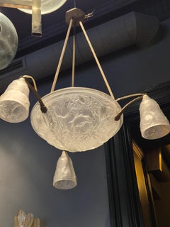 Art Nouveau Chandelier, glass shades with decor of poppies, France 1920s.