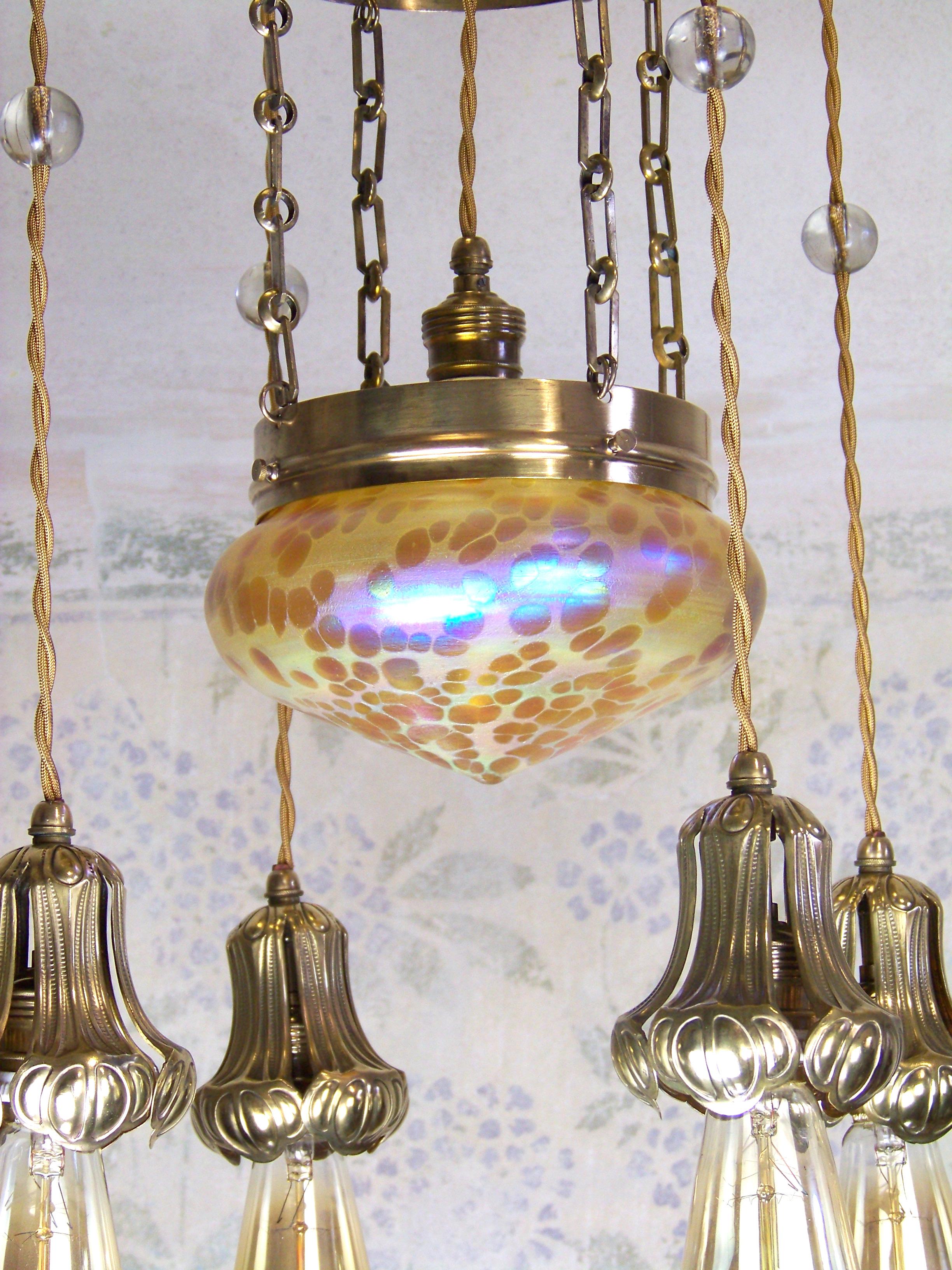 Fully functional. Brass body, new iridescent glass in Loetz style - Astraea decor. New wiring.