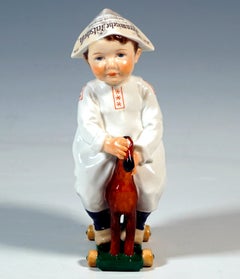 Art Nouveau Child Figurine, Hentschelkind, Boy Riding A Wooden Horse, circa 1906