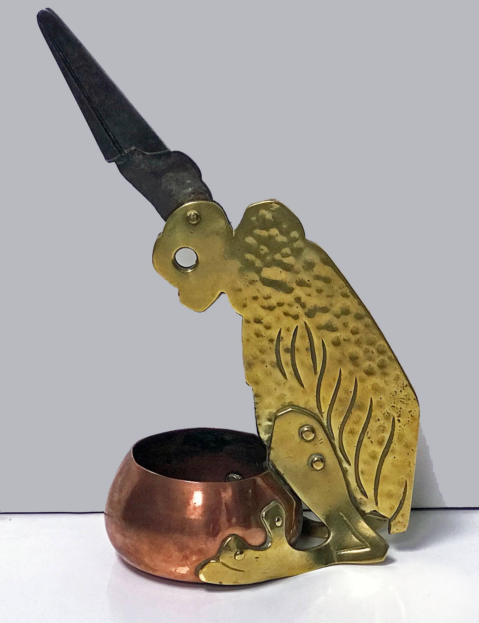 Art Nouveau Marabou stork cigar cutter, Ignatius Taschner, Munich, Germany, circa 1900. Ignatius Taschner (1871-1913), sculpture, medallist, graphic designer and Illustrator. Brass and copper riveted, the bird's-eye is the opening for the cigar and