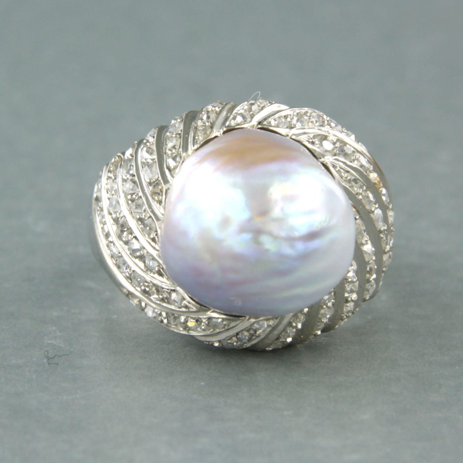 18k white gold ring set with pearl and old mine cut diamond up to 1.00ct - F/G - SI - ring size US 6 - EU 16.5(52)

detailed description:

the top of the ring is 1.6 cm wide and 1.4 cm high

total weight 12.1 grams

ring size US 6 - EU 16.5(52),