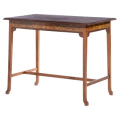 Art Nouveau coffee table with a bird's-eye design.