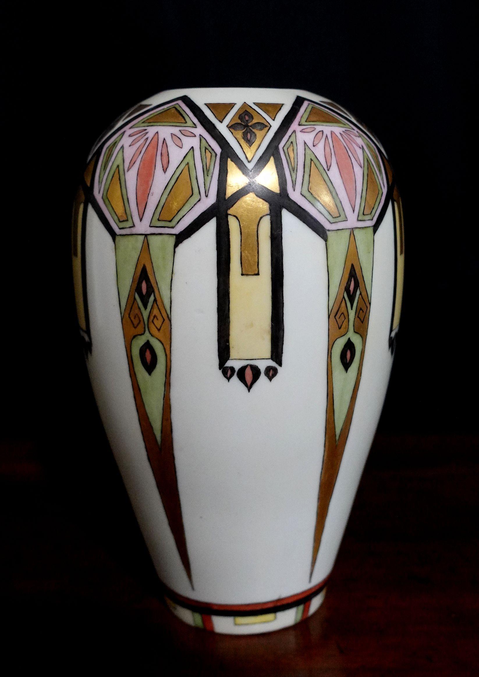 Art Nouveau era Continental hand-painted porcelain vase with geometric design. No apparent marks or signature. Measures approx. 8