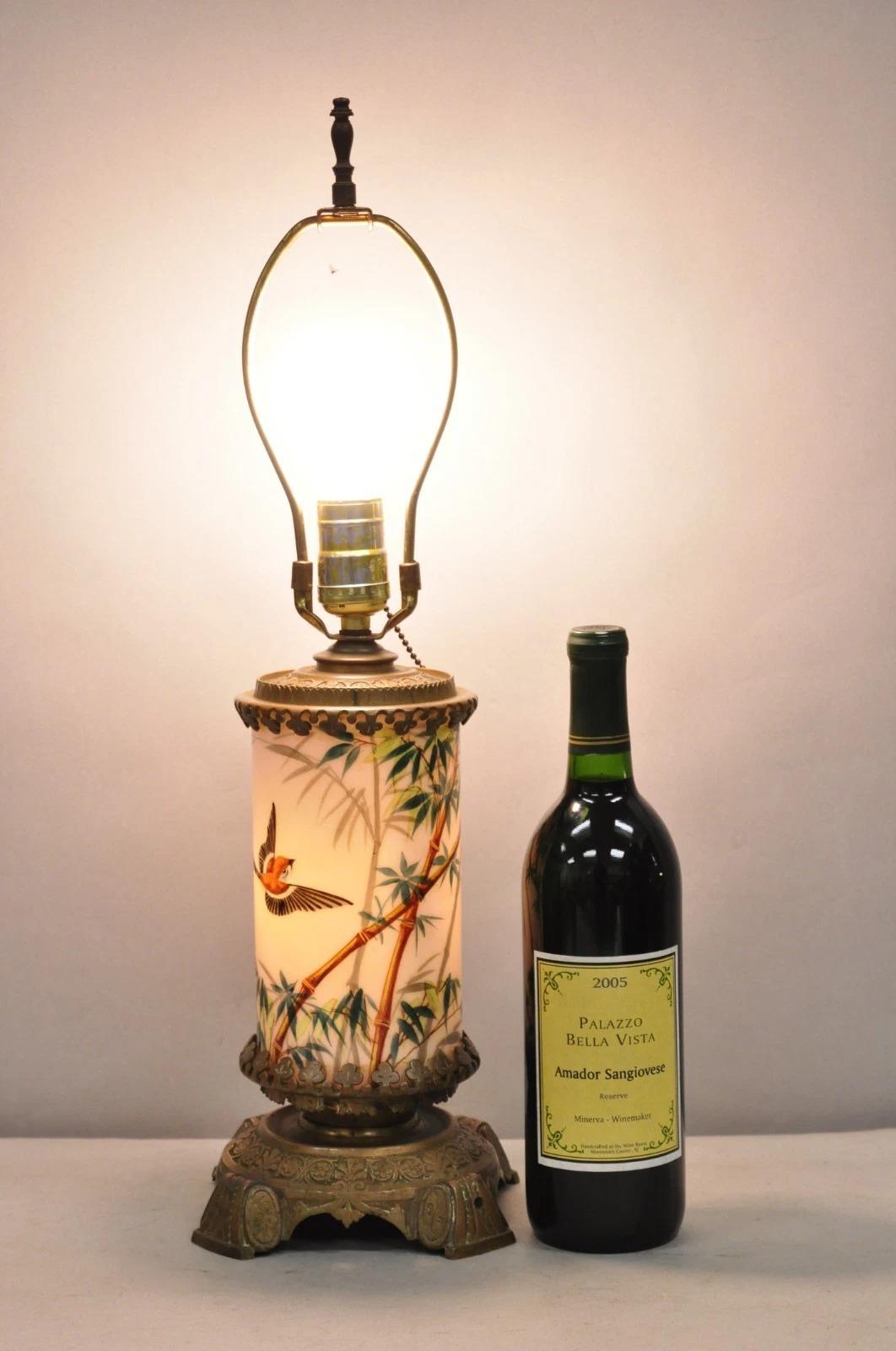 Antique French Art Nouveau Converted Oil Lamp Light Pink Glass Cylinder Bird Painted Bronze Table Lamp with Interior Light. Circa Early 20th Century. Measurements: 21