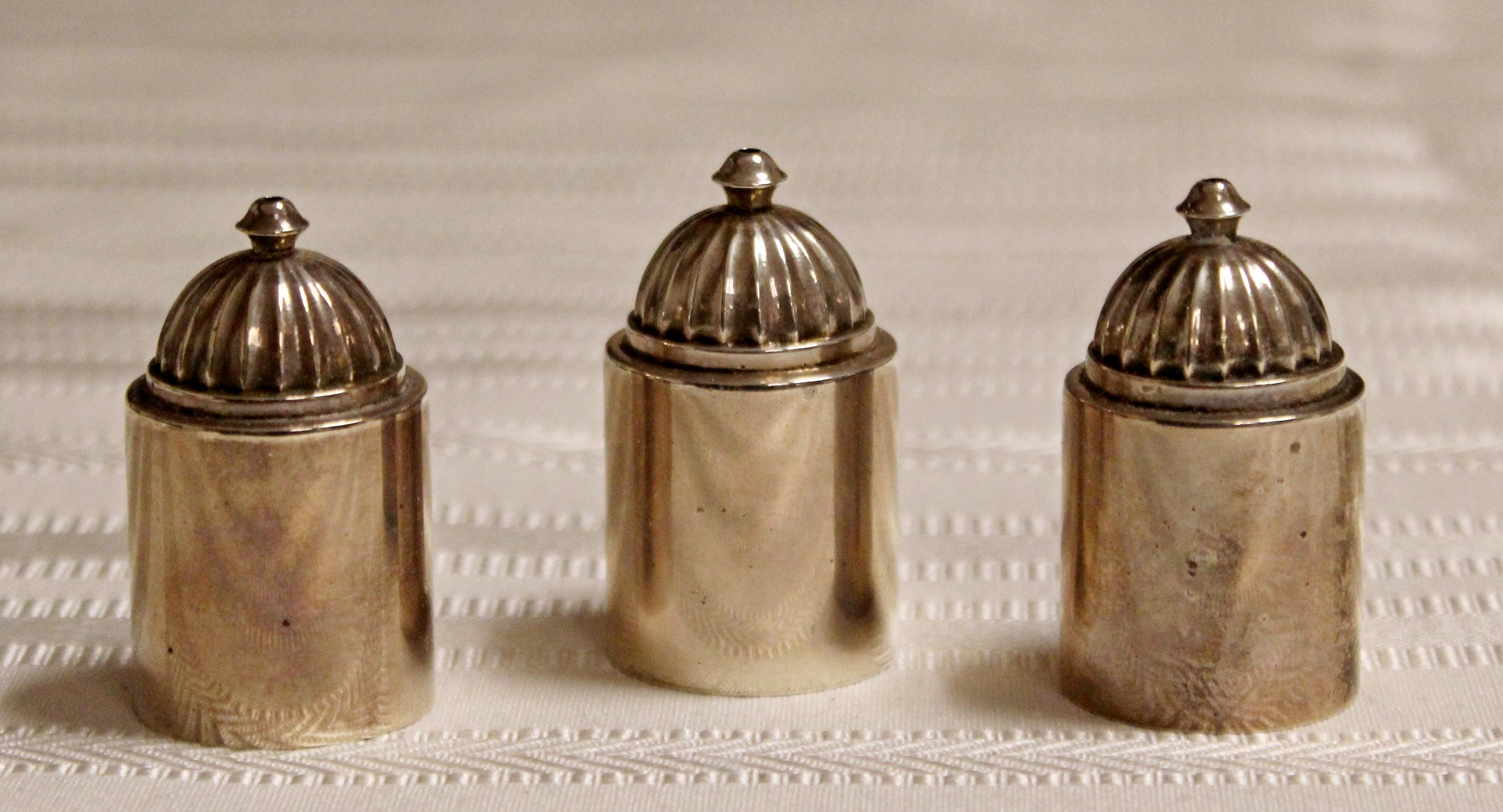 For your consideration is a sweet, Georg Jensen, sterling silver, set of three salt and pepper shakers, circa 1945. In excellent antique condition. The dimensions are 1