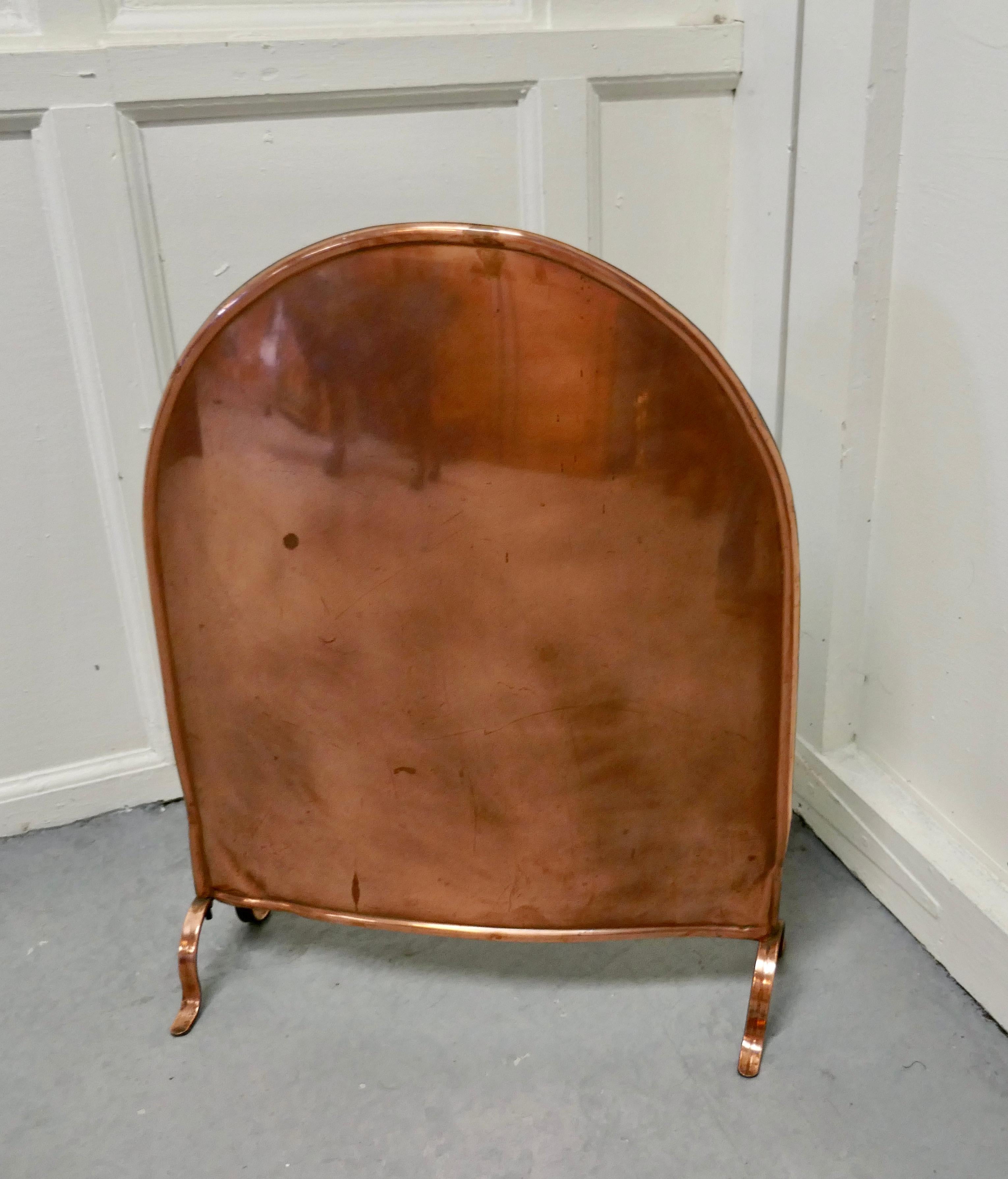 Art Nouveau decorative copper fire screen.


This is a most charming brass fire screen the top is arched and it has slightly bowed shape like a shield
The screen is good quality and made in solid copper with slightly splayed feet
The screen is