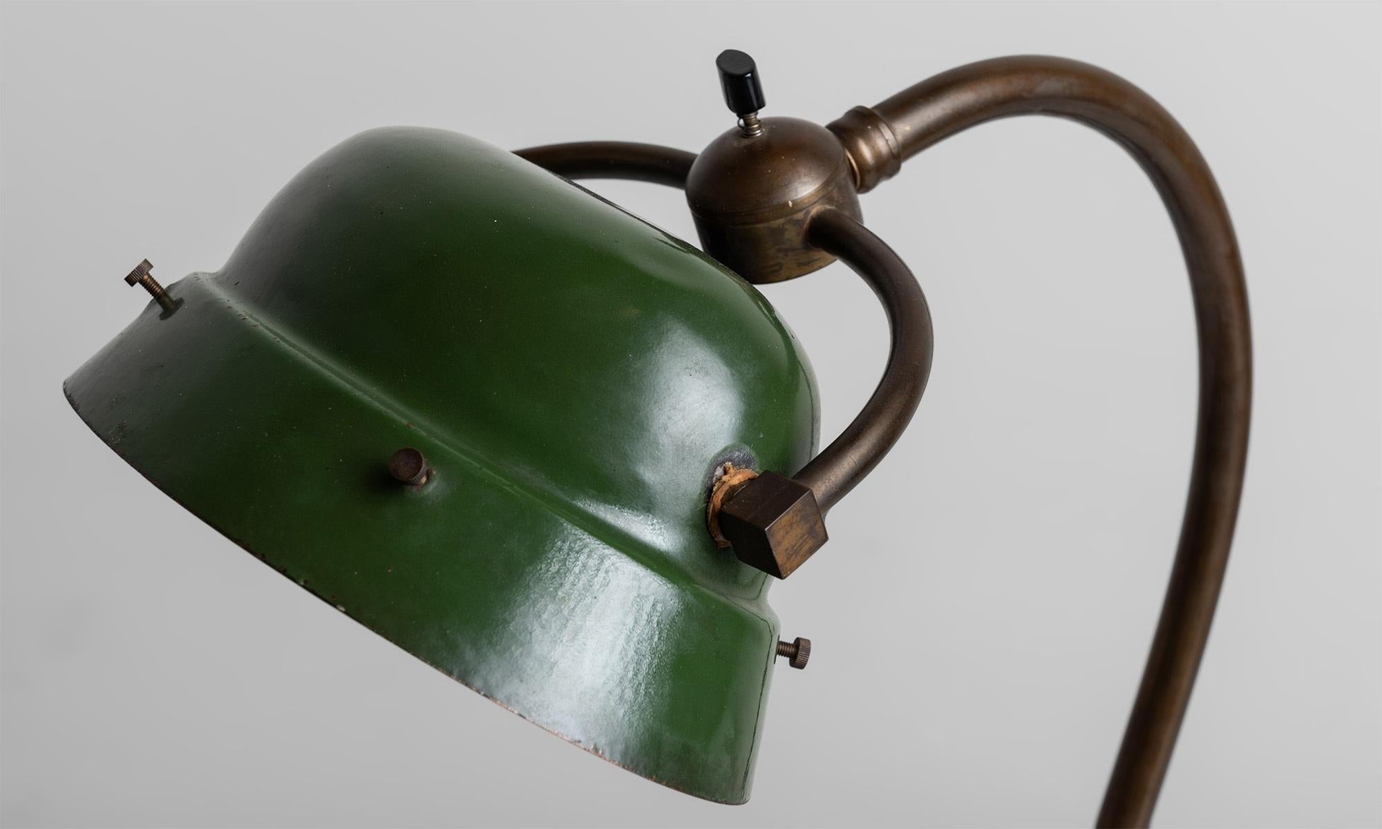 Green enameled metal shade with exquisite blue glass diffuser, on brass base with monogram CJR.


Measures: 9