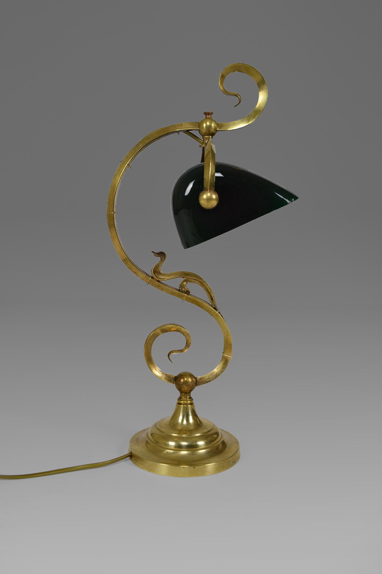 Table or desk or piano lamp. 
Bronze and green opaline glass. 
Art Nouveau, France, circa 1905.

Very good condition, new electrification.