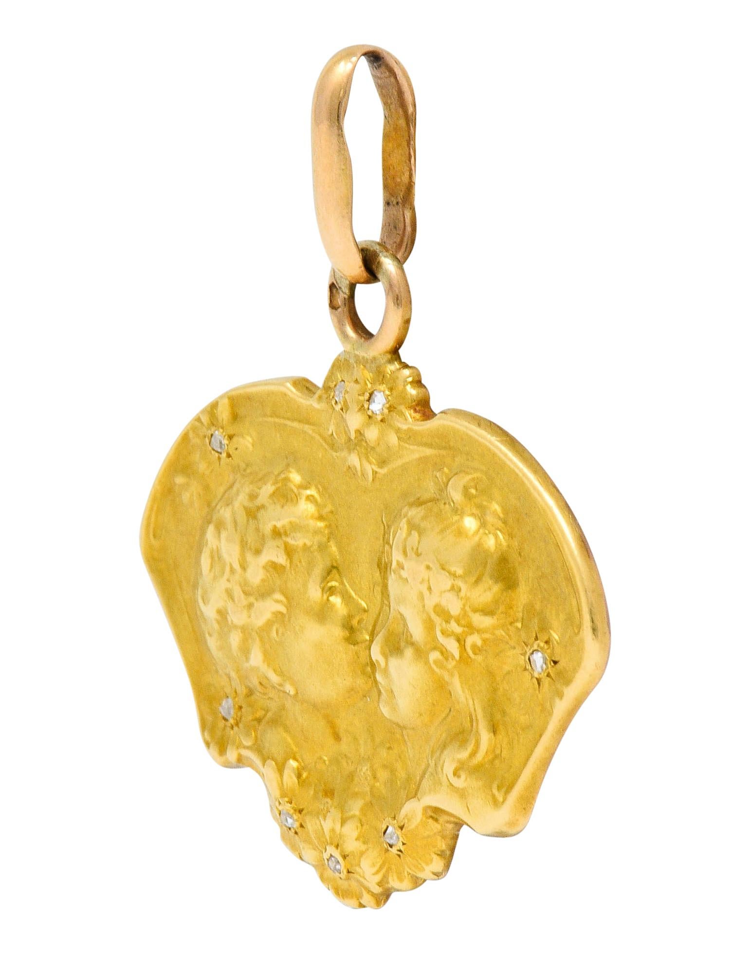Art Nouveau Diamond 18 Karat Two-Tone Gold Child Pendant In Excellent Condition In Philadelphia, PA