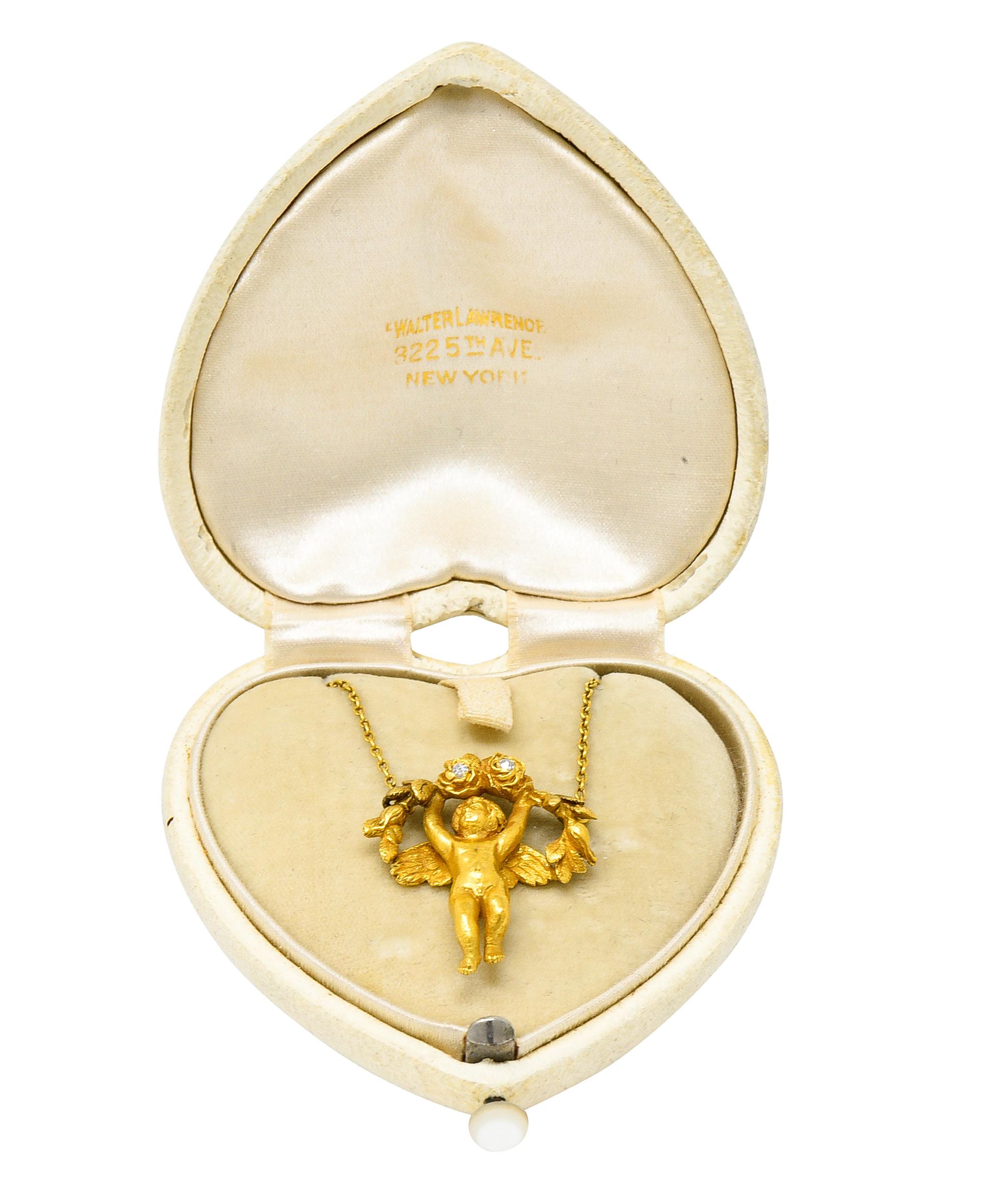 Cable chain necklace centers a highly rendered cherubic station

Matte gold with spread wings and upholding a bushel of roses

Accented by old European cut diamonds weighing approximately 0.05 carat

Eye clean and bright - quality consistent with