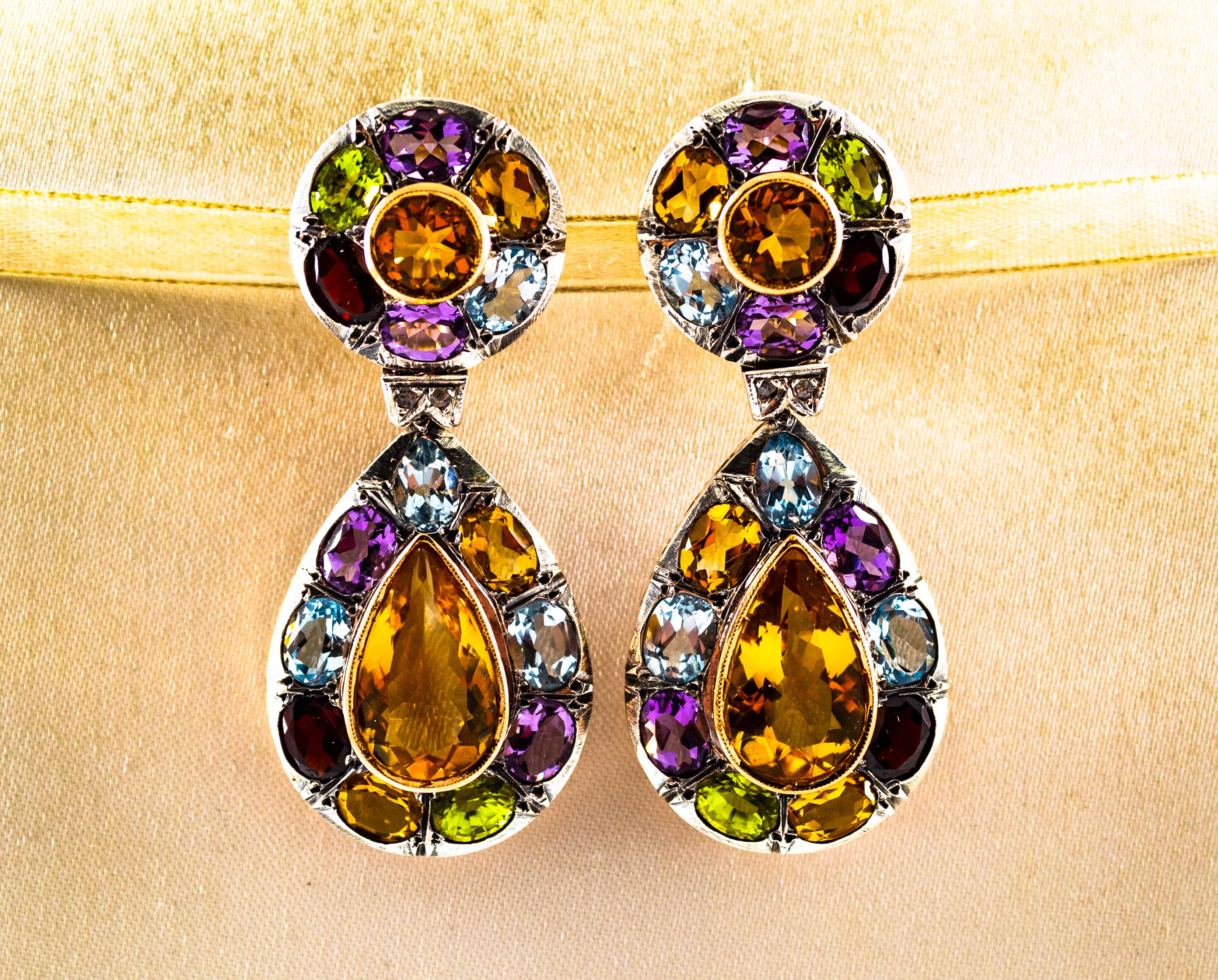 These Earrings are made of 9K Yellow Gold and Sterling Silver.
These Earrings have 0.05 Carats of White Rose Cut Diamonds.
These Earrings have also Blue Topaz, Amethyst, Citrine, Garnet and Peridot.

All our Earrings have pins for pierced ears but