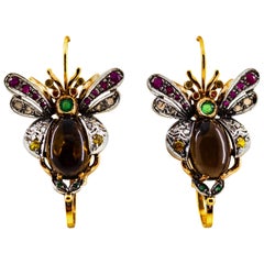 Boucles d'oreilles à levier Art Nouveau en or jaune avec diamants, émeraudes, saphirs et tourmalines