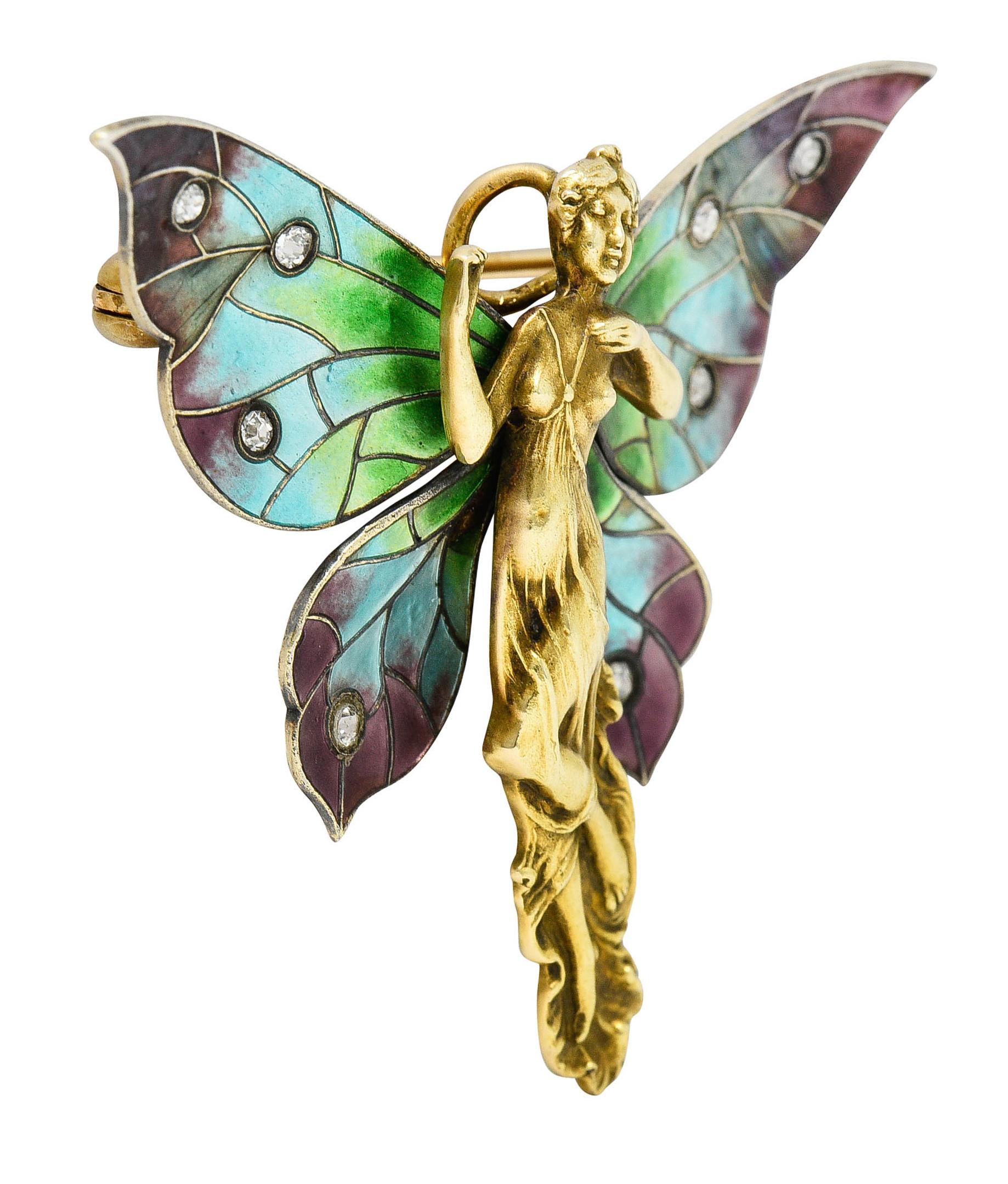 Brooch is designed as a fairy with a highly rendered female form

With spread wings shining with iridescent enamel - ombrè green, blue, and purple

No loss - excellent for age

Set with old single cut diamonds weighing approximately 0.18