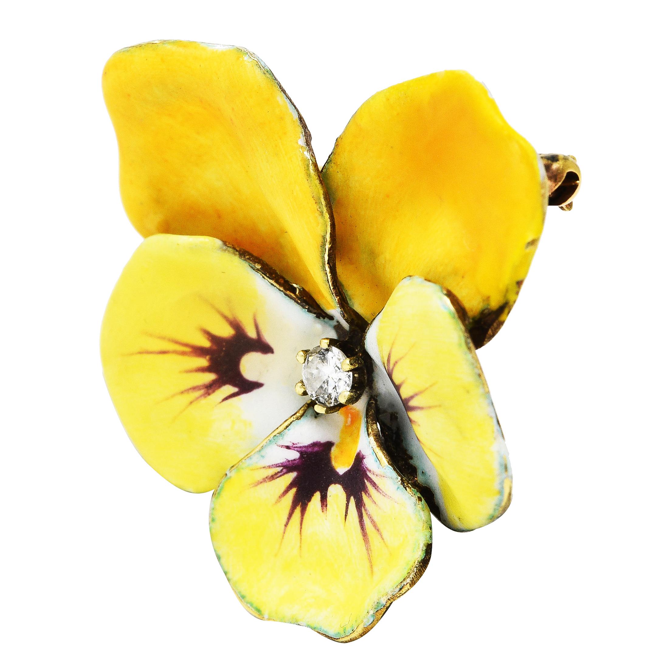 Pendant brooch is designed as a pansy flower with delicately painted matte enamel petals. Opaque purple, white, and yellow - exhibiting some loss. Accented by a prong set transitional cut diamond. Eye clean and bright. Reverse is oxidized from age.