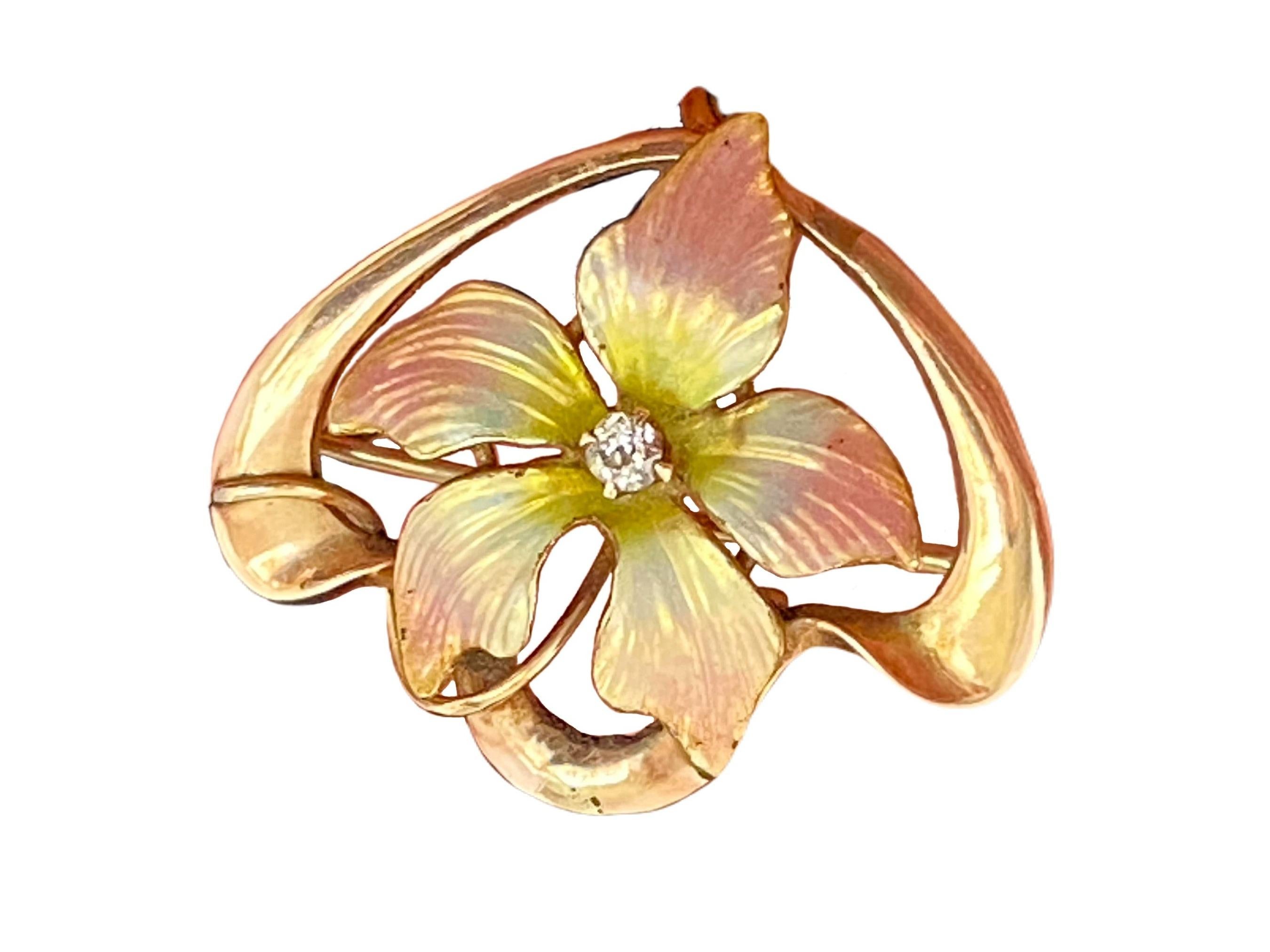 This stunning Art Nouveau Diamond Enamel 14K Rose Gold Flower Antique Convertible Brooch Pendant is an eye-catching piece of jewelry. Featuring a delicate enameled flower centered in swooping curves of 14K rose gold, this piece is beautifully