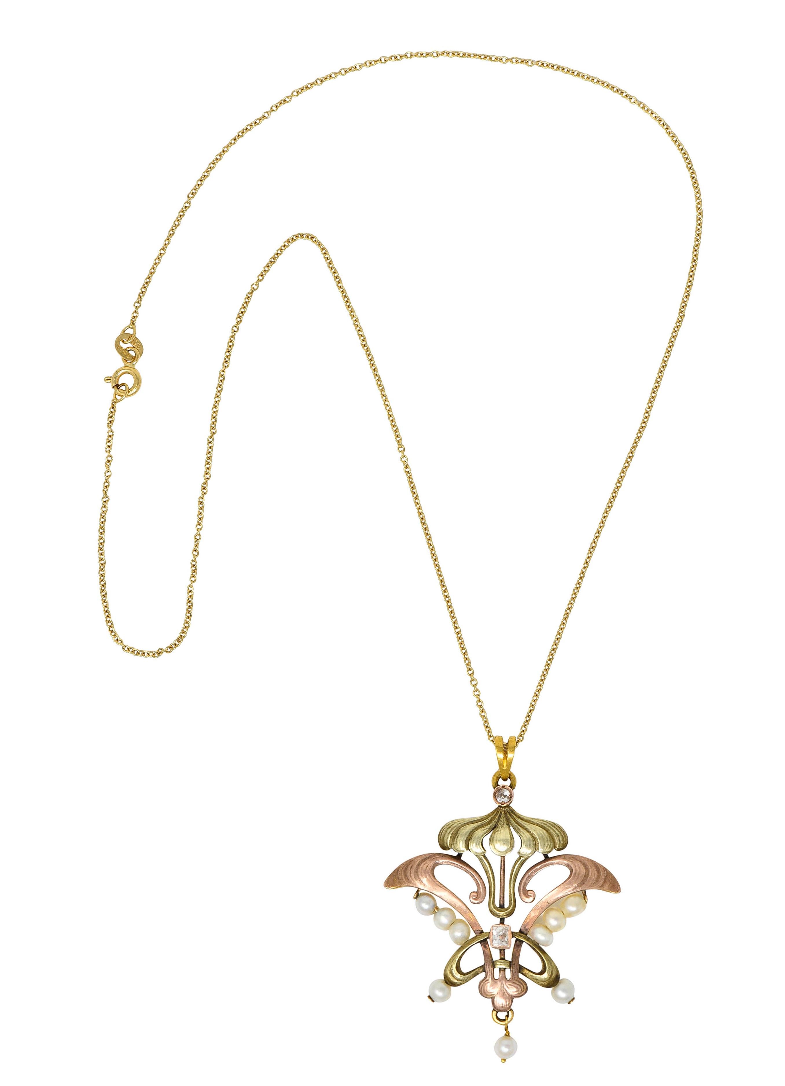 Classic cable chain necklace suspends a pendant comprised of rose and green gold repoussè whiplash

Centering an old mine cut diamond weighing approximately 0.15 carat - F color with SI clarity

With an 0.08 carat old European cut diamond set near