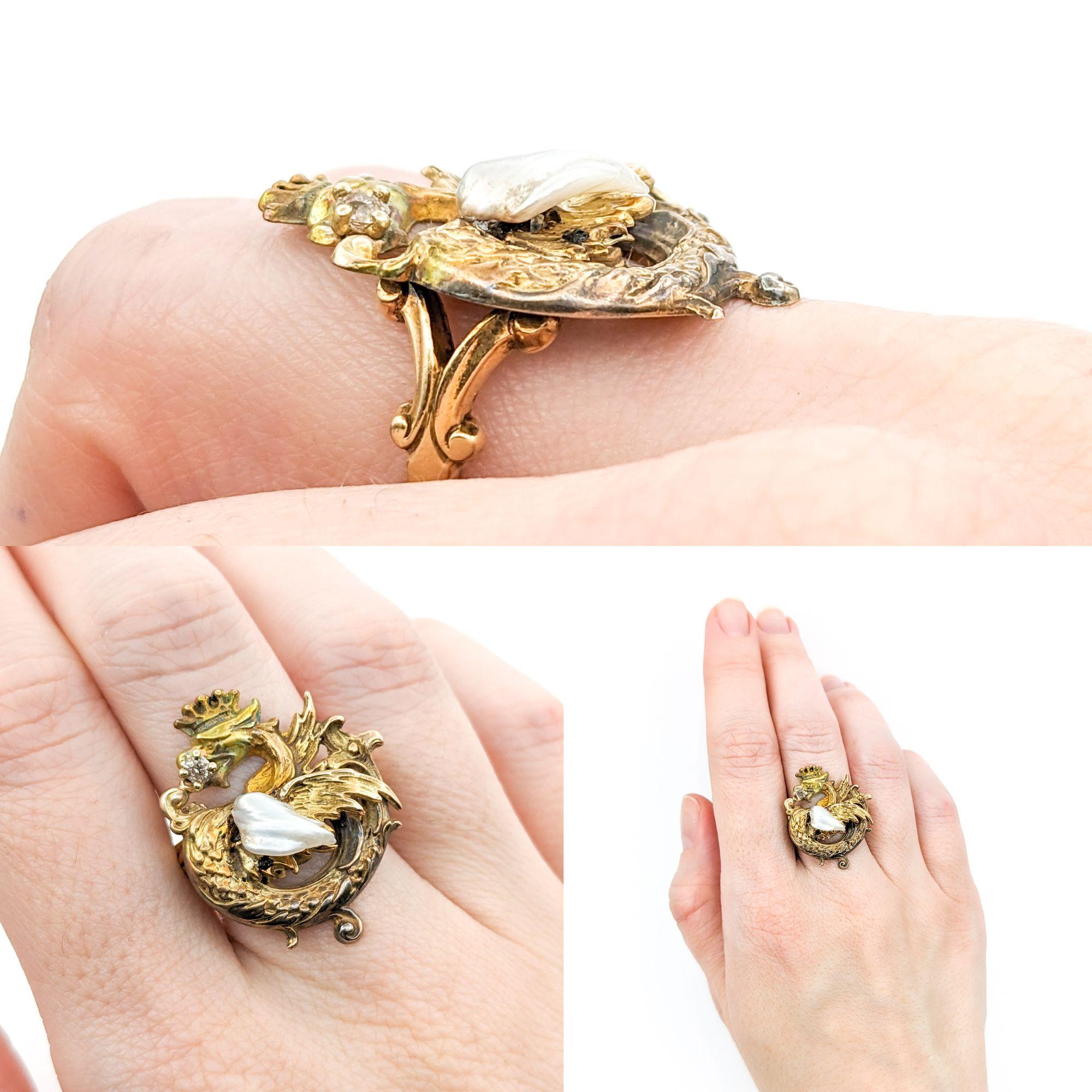 Art Nouveau Era Diamond & Pearl Ring In Yellow Gold

Immerse yourself in the enchanting beauty of the Art Nouveau era with this exquisite dragon ring, skillfully crafted in 12k yellow gold. This piece is a remarkable representation of the Art