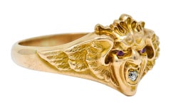 Art Nouveau Diamond Ruby 14 Karat Gold Winged Green Man Band Ring